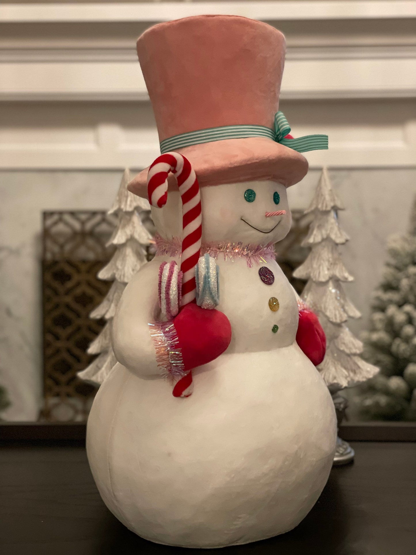 24”h x 13.4” w Snowman with pink hat holding a candy cane. Christmas. Ornament. Tabletop. Display.