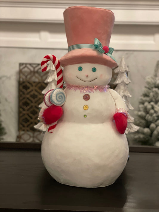 24”h x 13.4” w Snowman with pink hat holding a candy cane. Christmas. Ornament. Tabletop. Display.