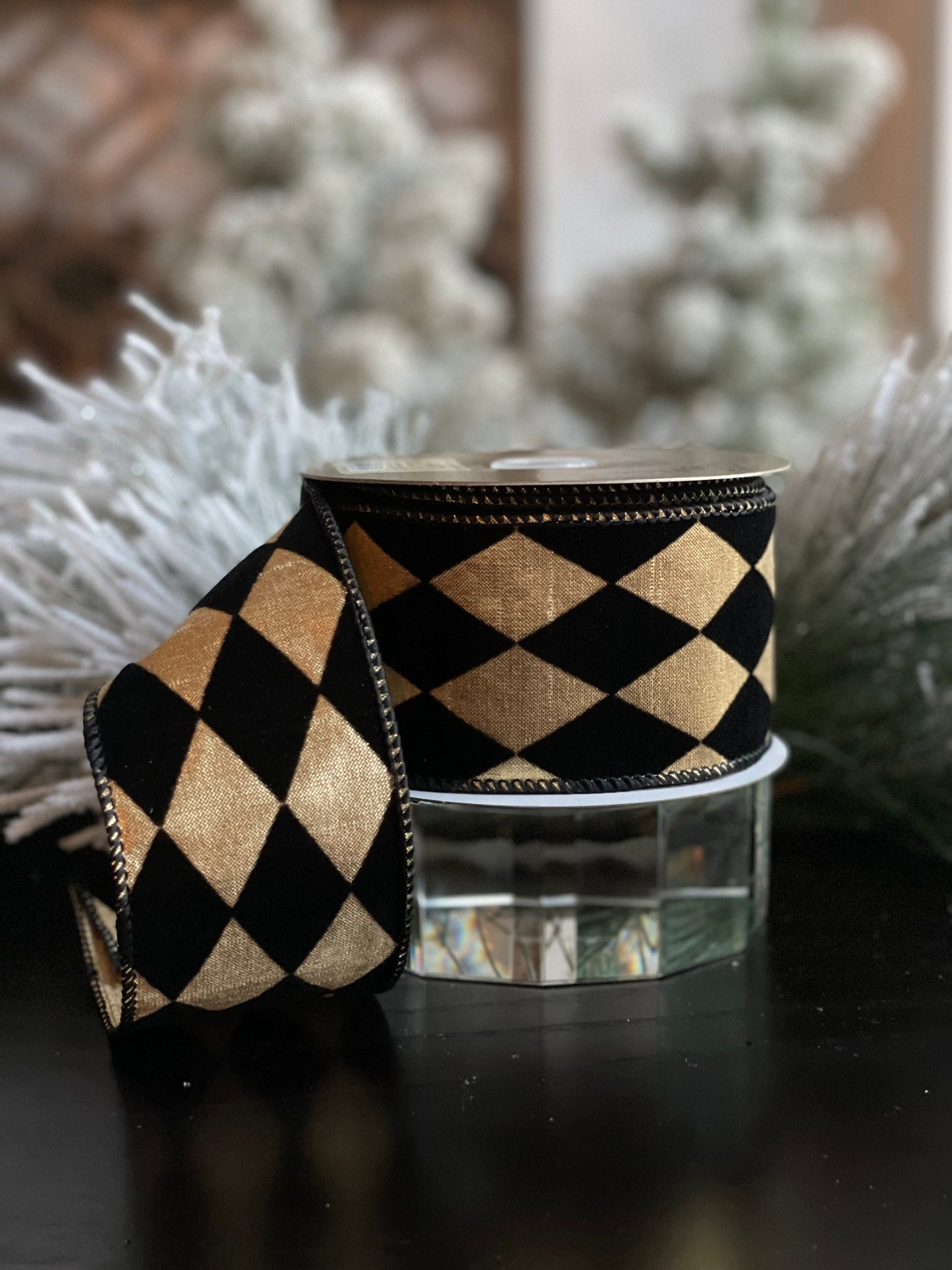 2.5"X 10 yds. Diamond ribbon. Black velvet diamonds. Black and gold. Wired.