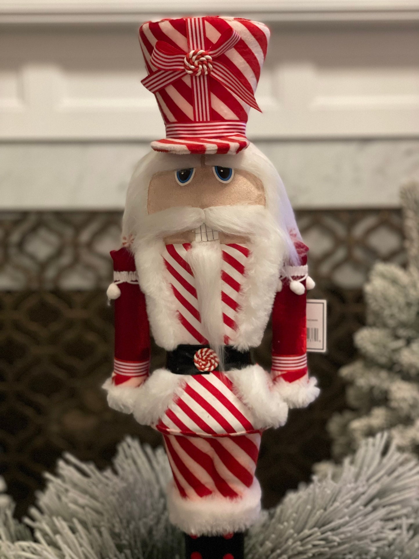 25" Nutcracker peppermint fabric styro. Candy nutcracker.