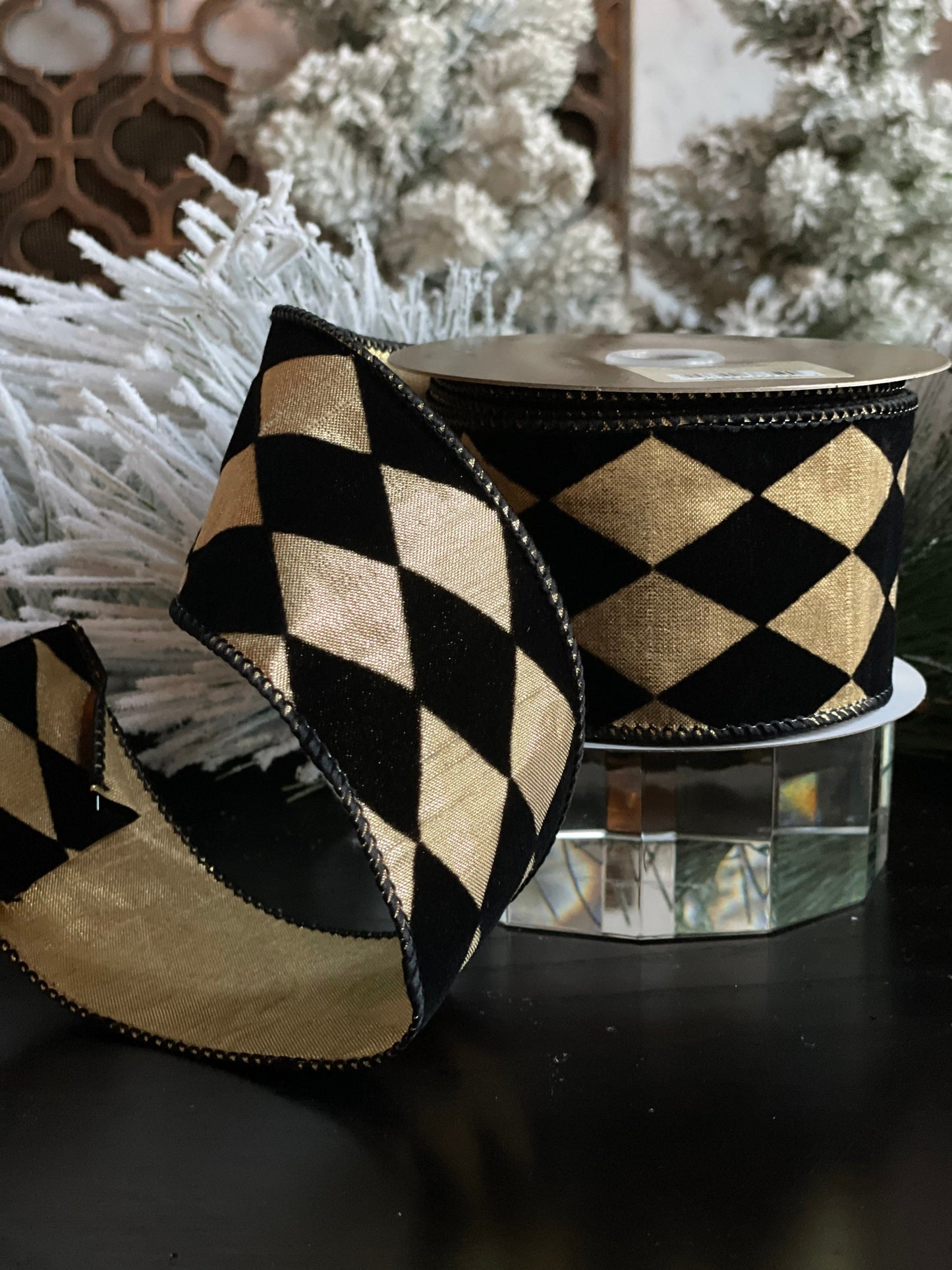 2.5"X 10 yds. Diamond ribbon. Black velvet diamonds. Black and gold. Wired.