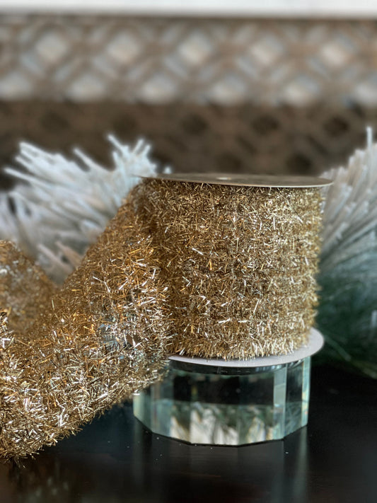 4"x10 yds. or 2.5”x 10yds. tinsel ribbon. Champagne. Wired.