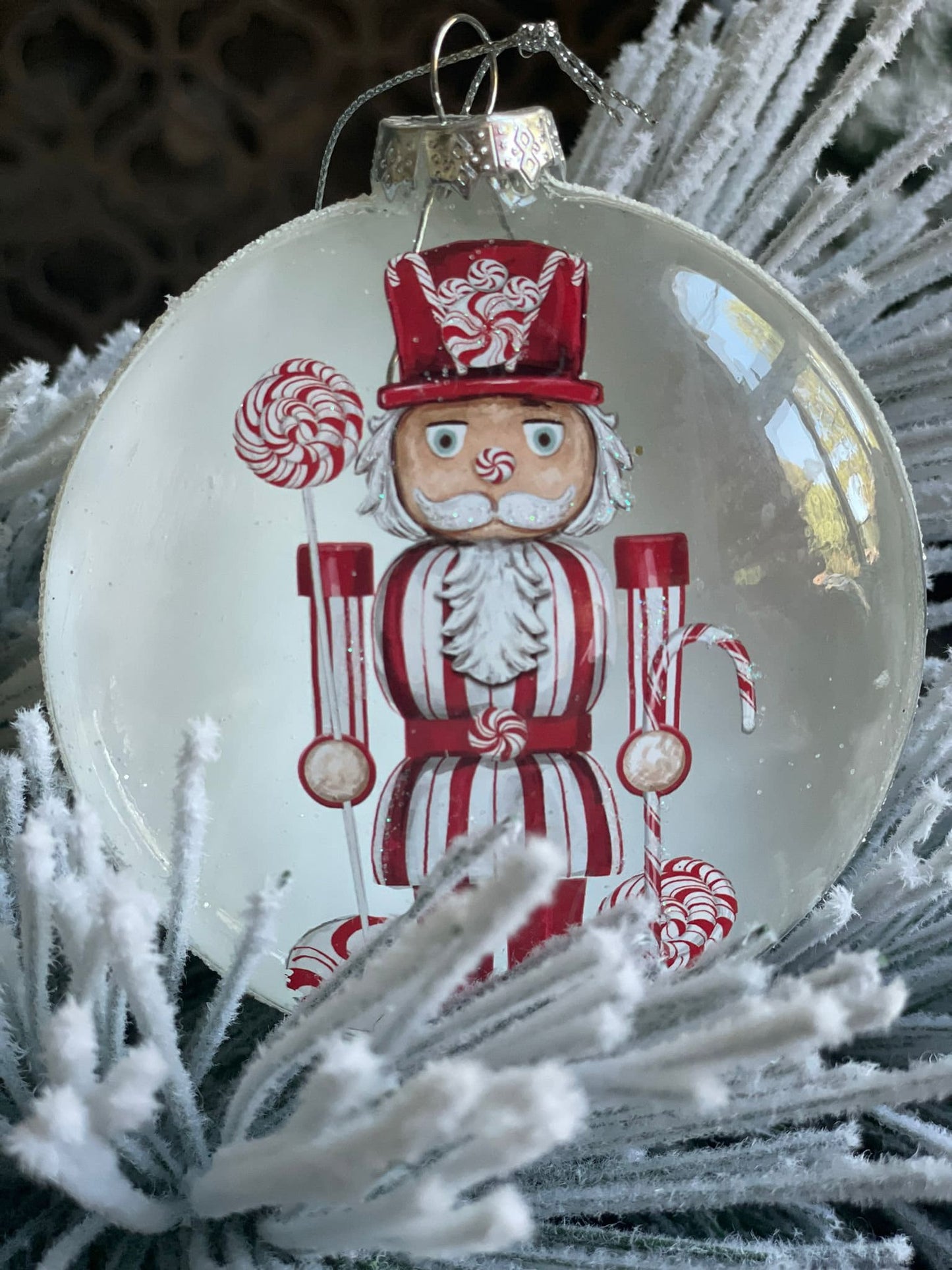 4" Glass candy nutcracker disc ornament.*