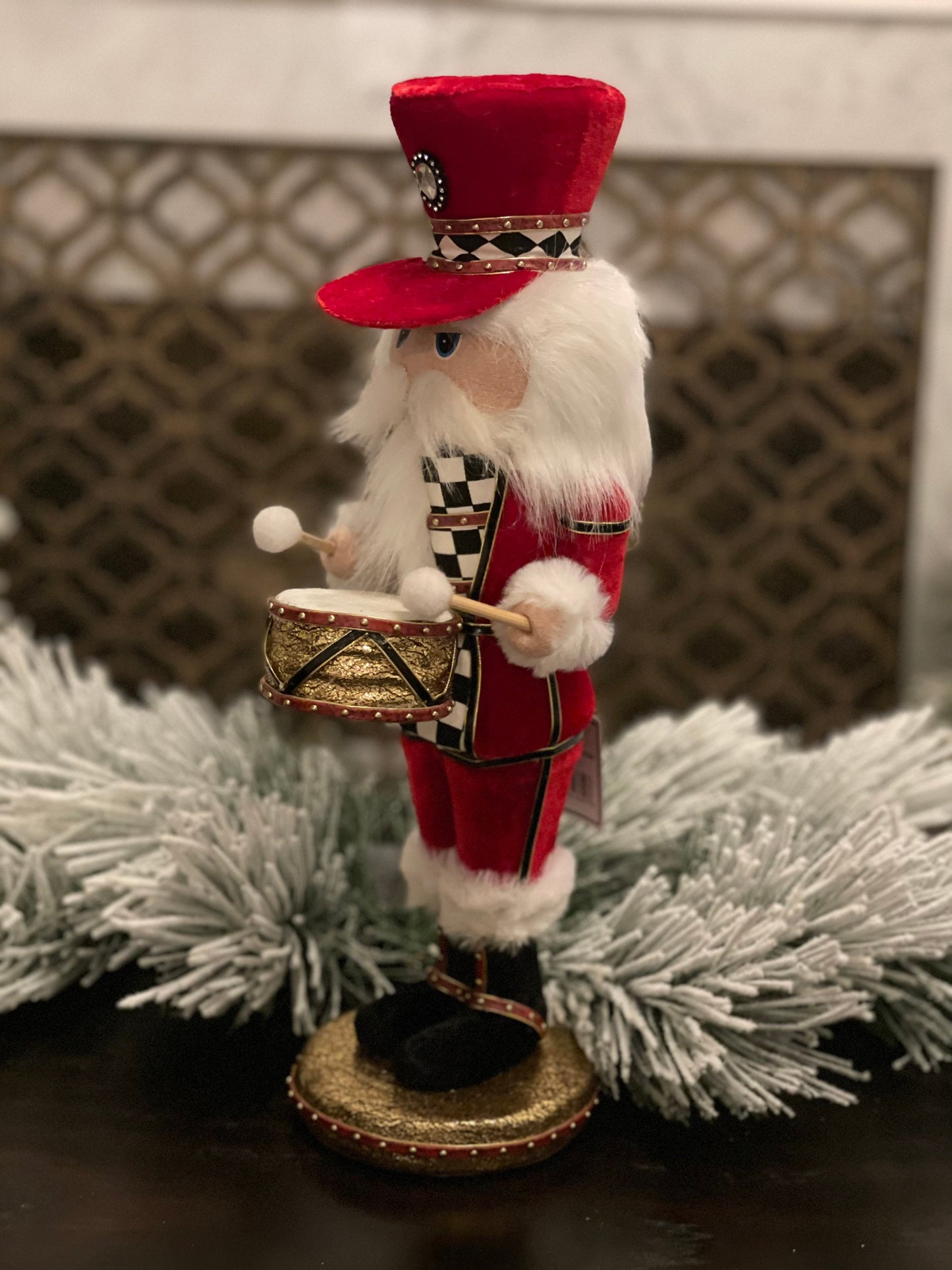 16” Nutcracker in red velvet with a checkered pattern band in his hat that matches his jacket