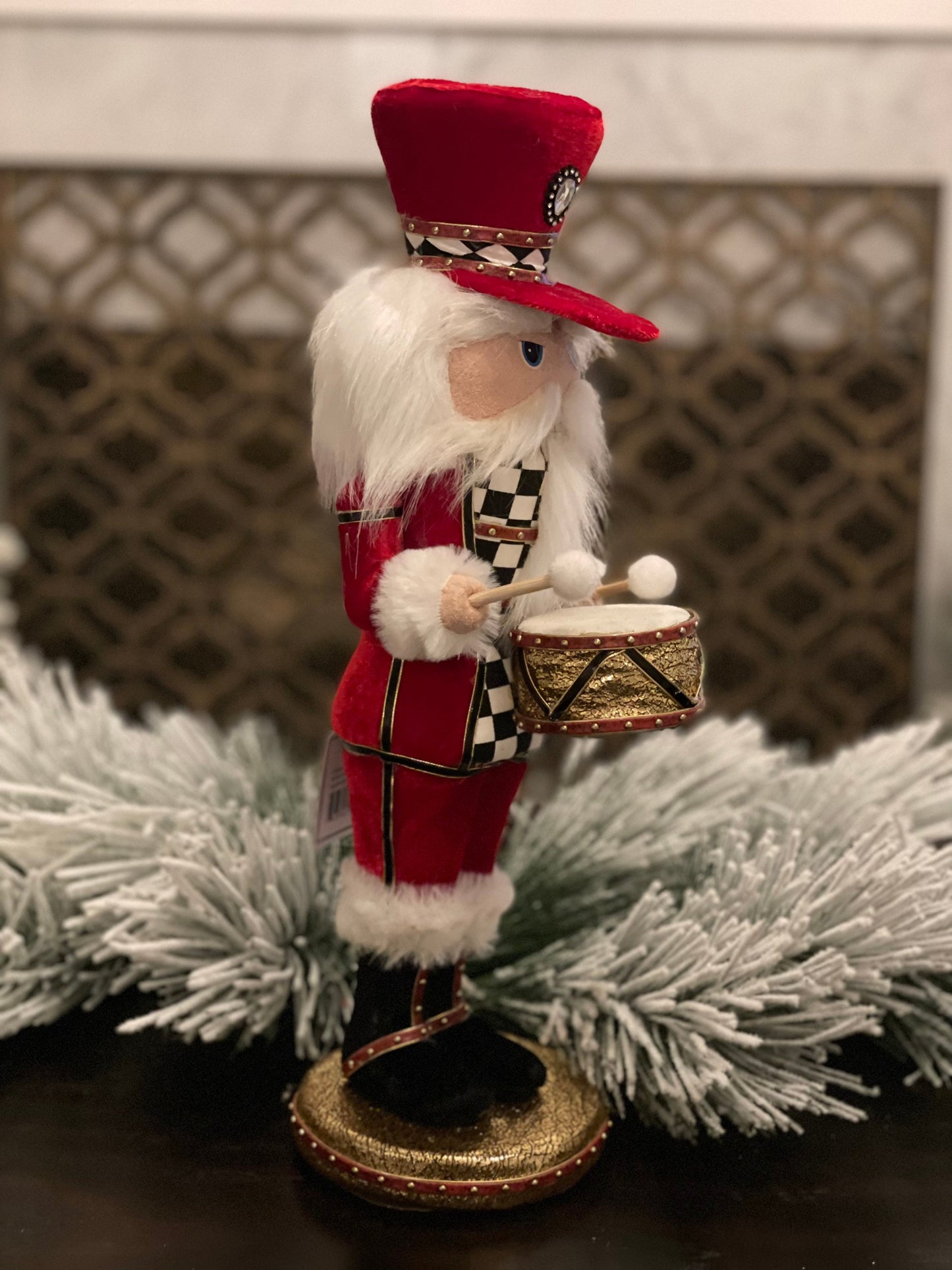 16” Nutcracker in red velvet with a checkered pattern band in his hat that matches his jacket
