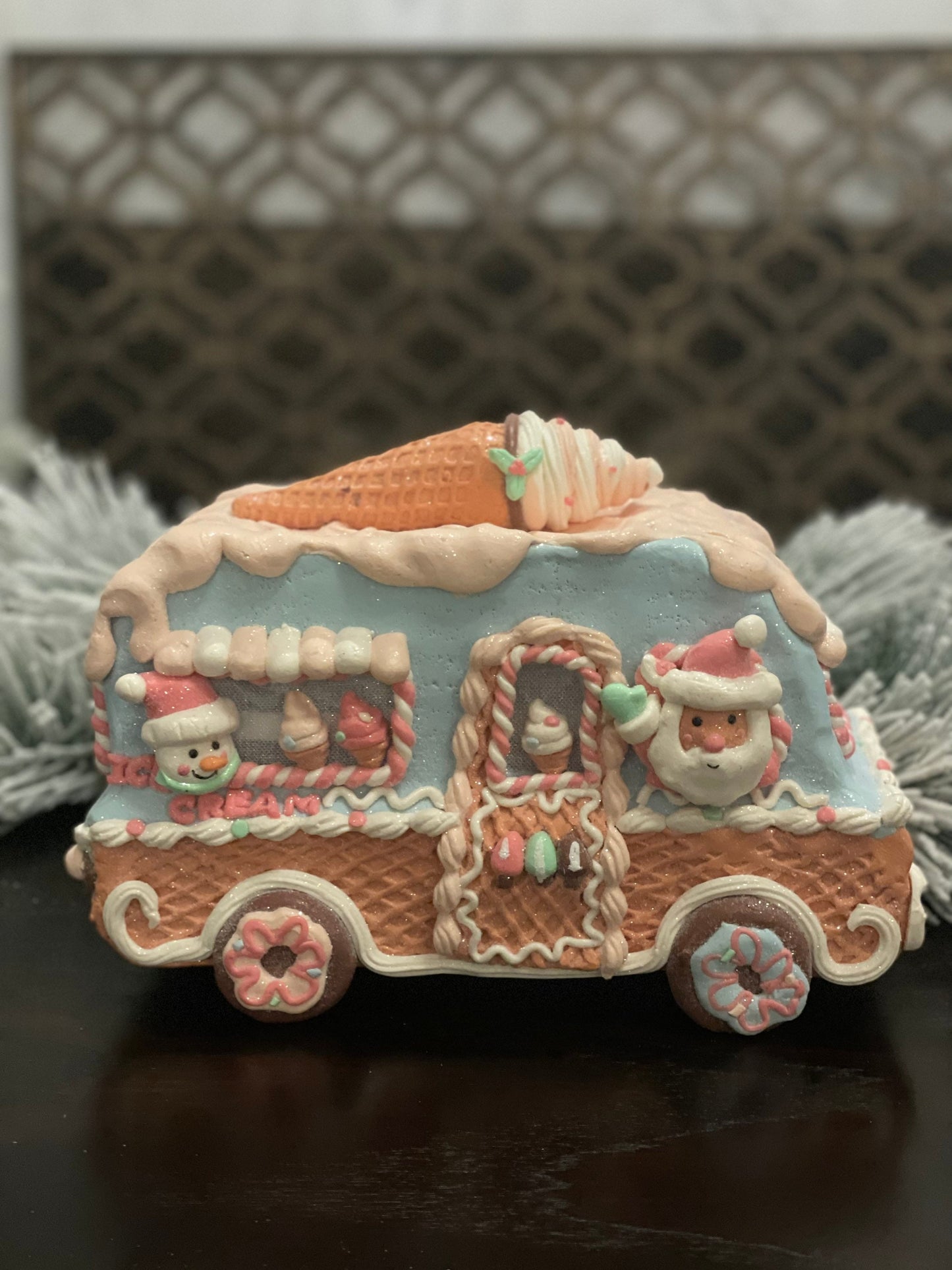 11”L x 8”H x 6W. Gingerbread ice cream truck. Lighted. Pastel colors.