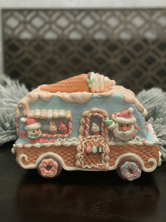 11”L x 8”H x 6W. Gingerbread ice cream truck. Lighted. Pastel colors.
