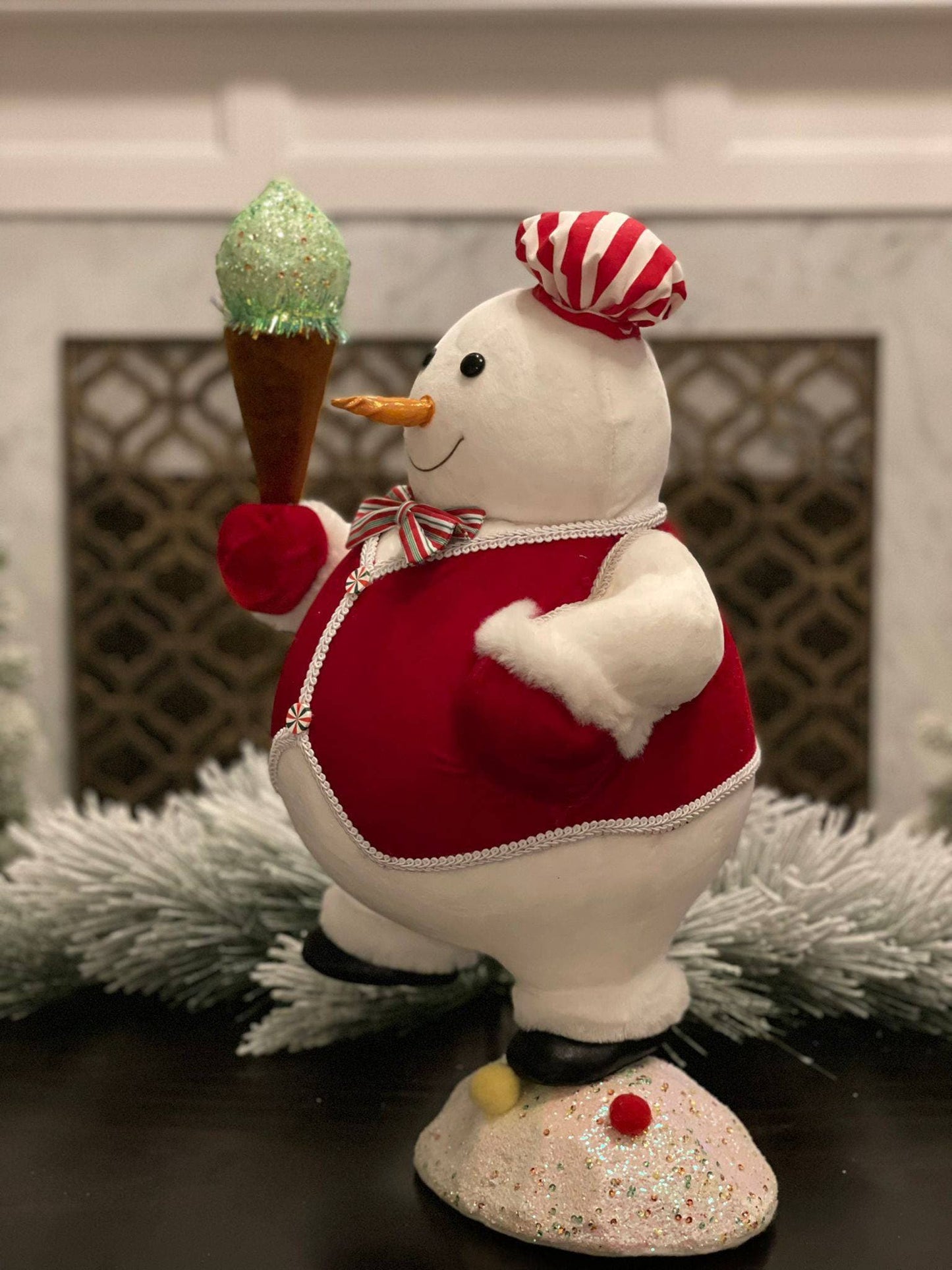 22” snowman with ice cream cone. Lightweight.