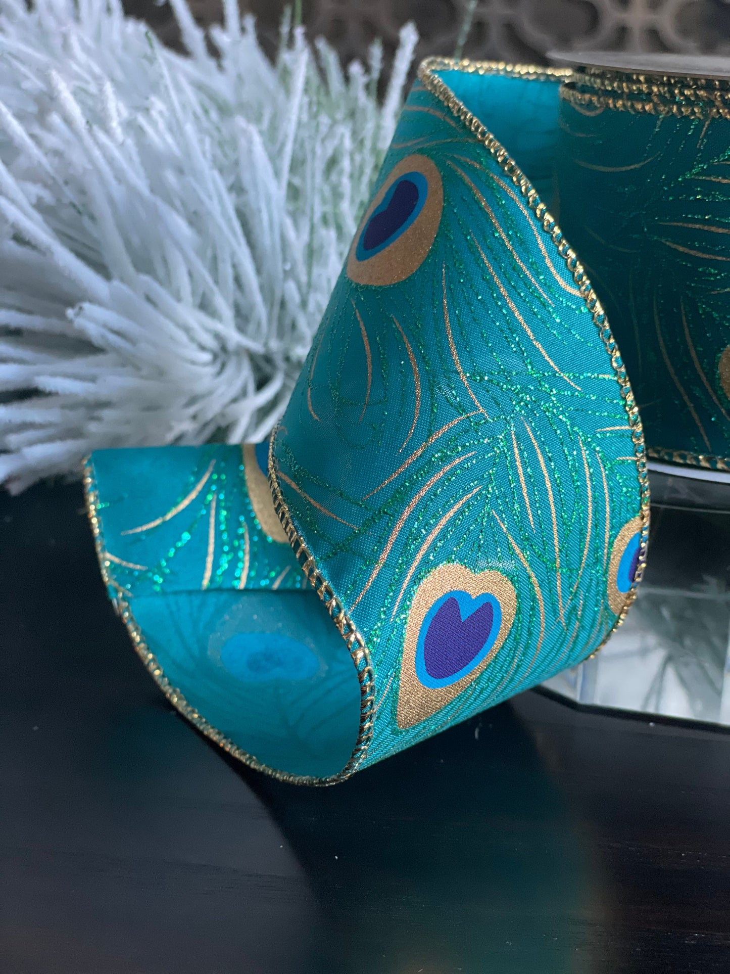 2.5"x10 yds. peacock ribbon. Wired.
