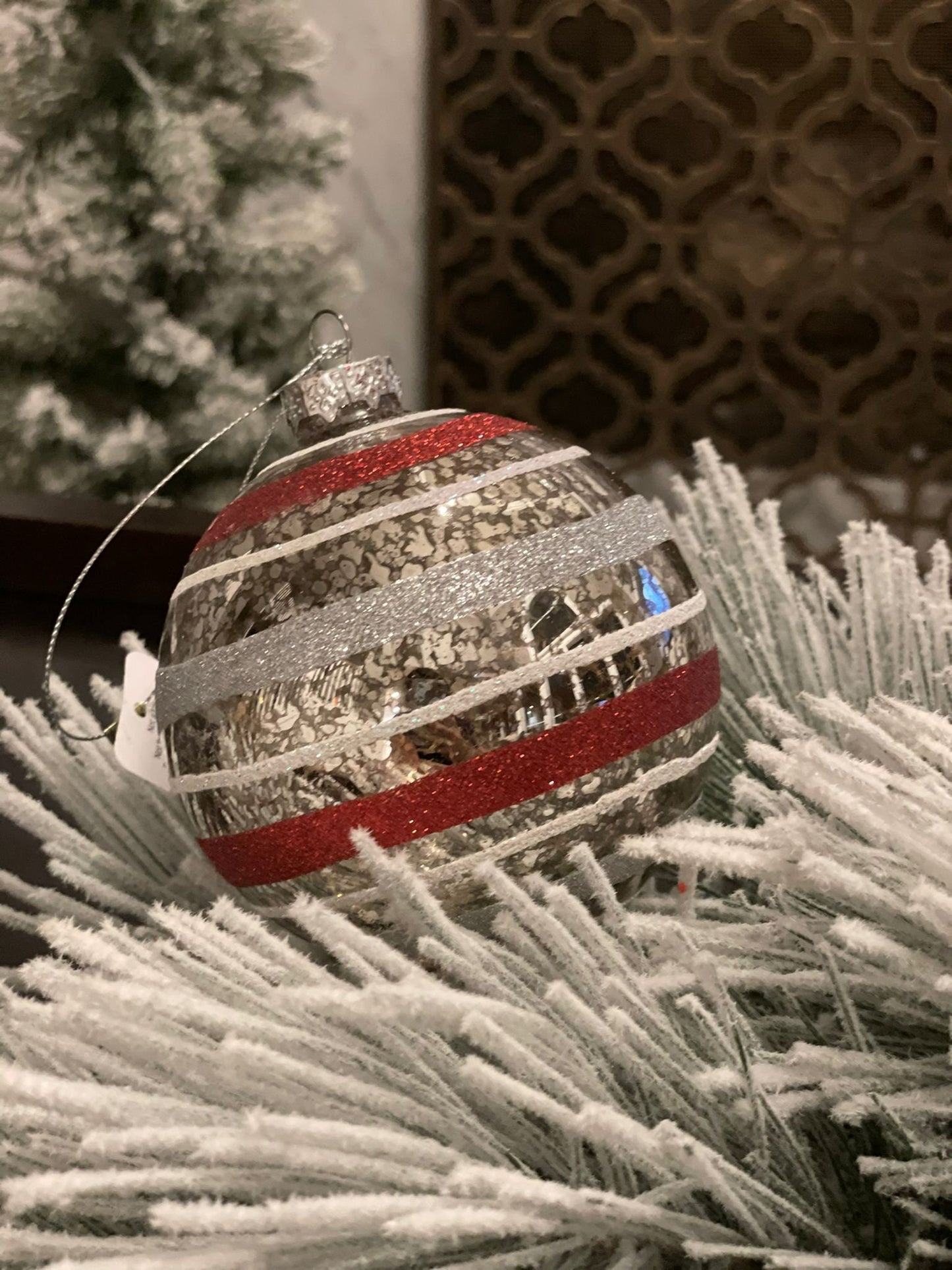 4" Striped glass ornament. Red and silver.