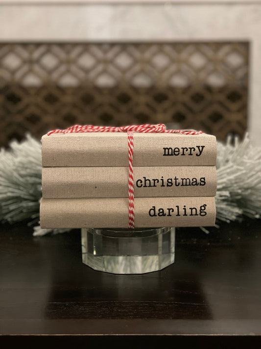8" Merry Christmas darling stacked books.