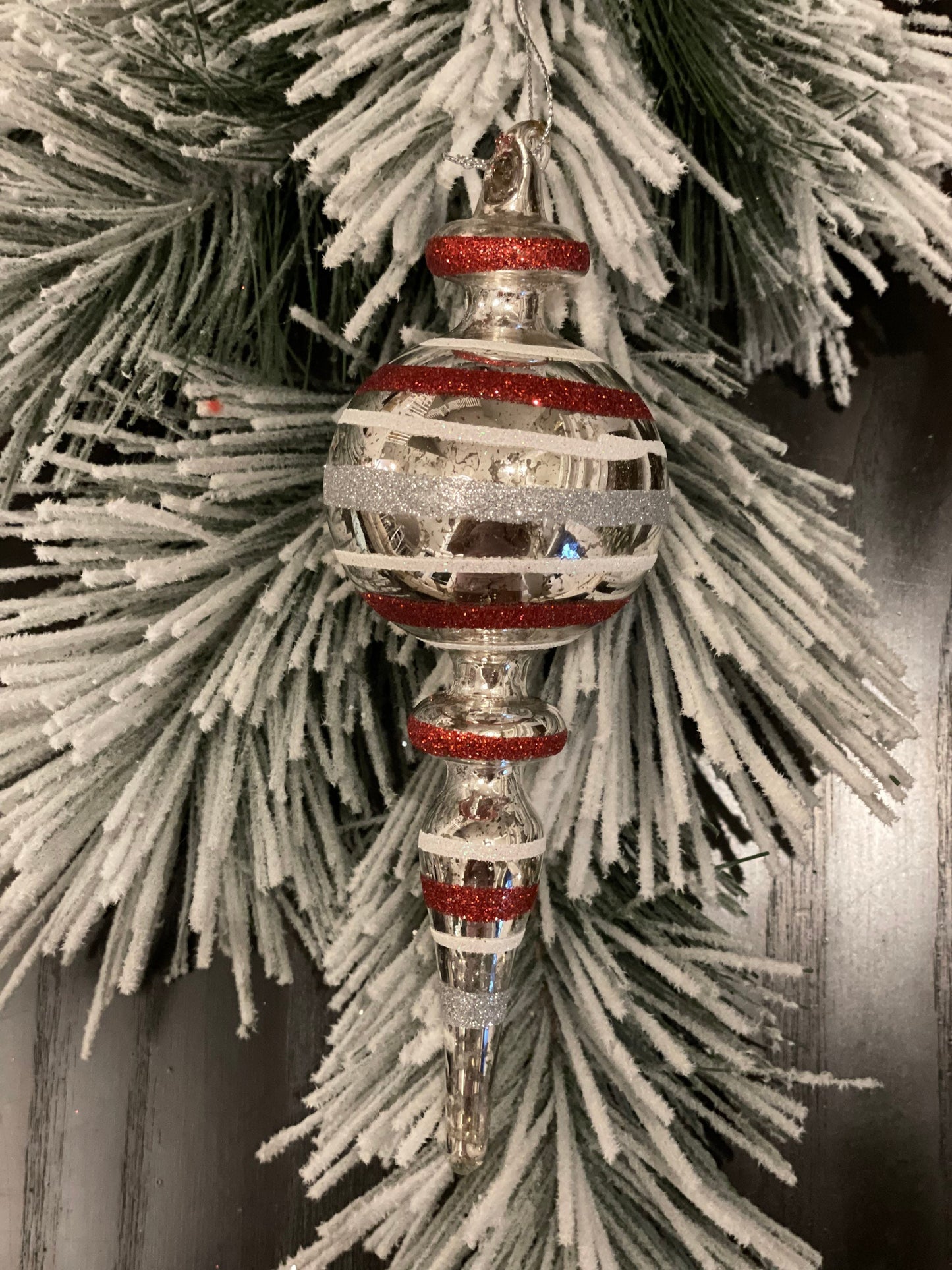 9.25" Striped glass finial ornament.