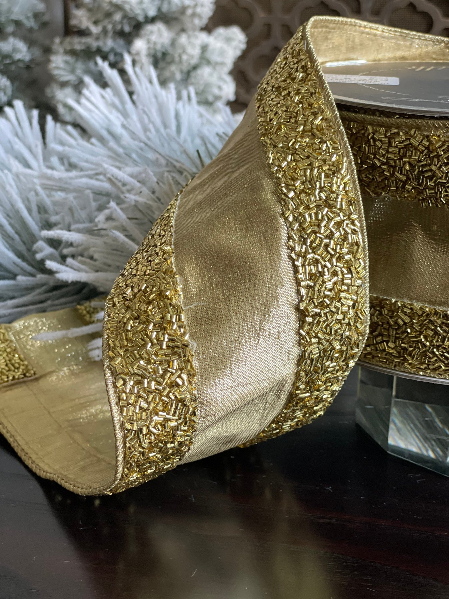 4"x10 yards tinsel borders gold.