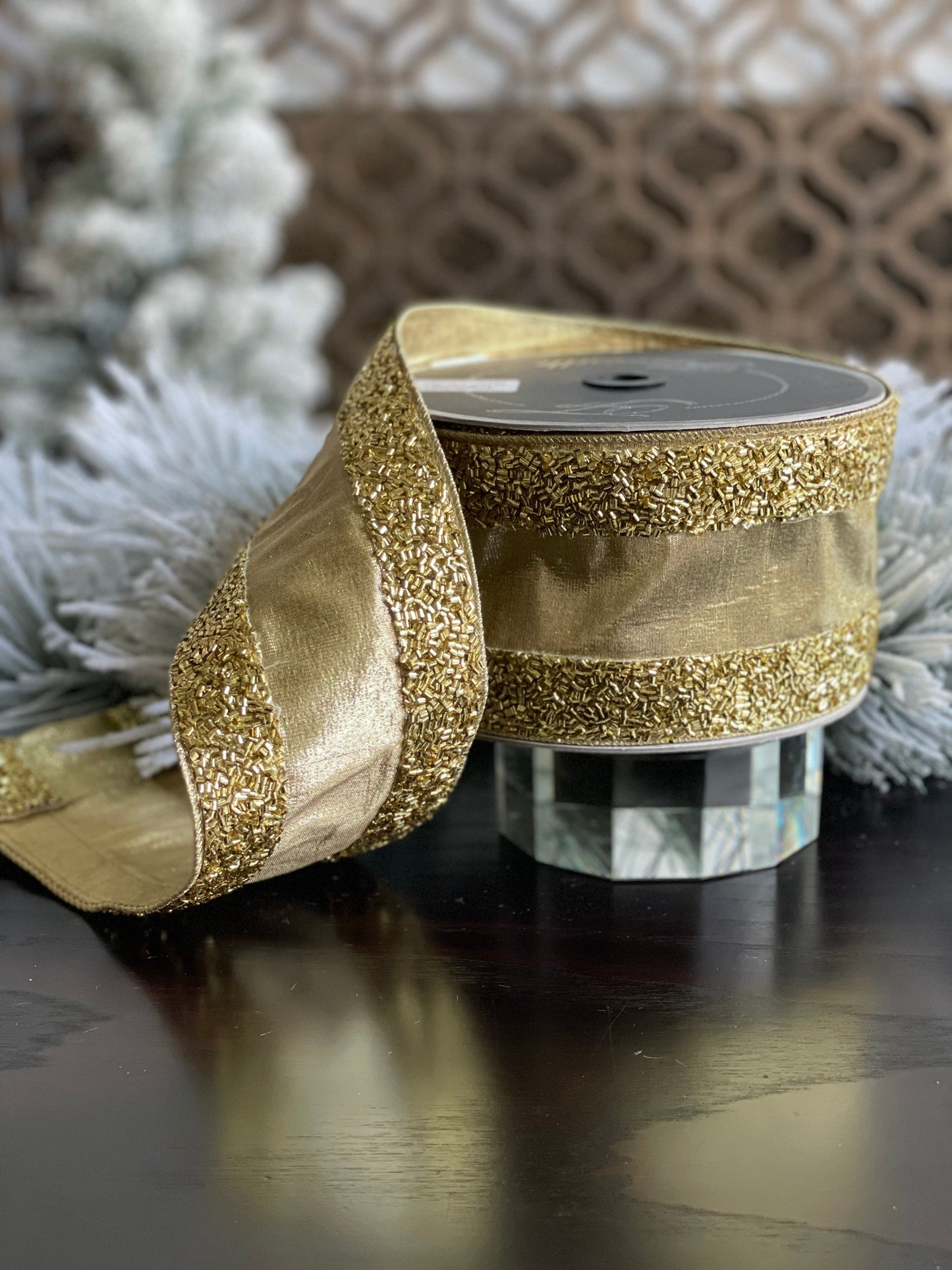 4"x10 yards tinsel borders gold.
