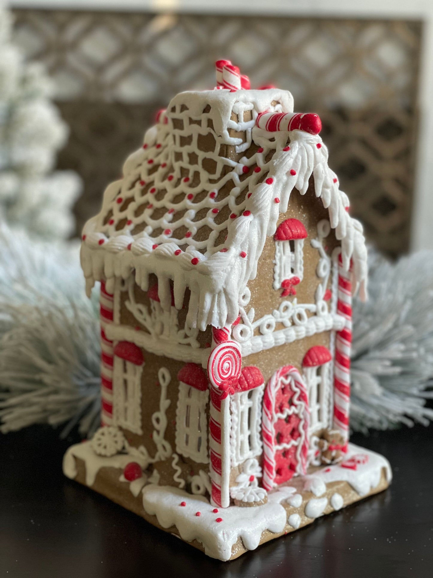 11.5”H x 6.5” W. Gingerbread lighted house with chimney. Red and white.