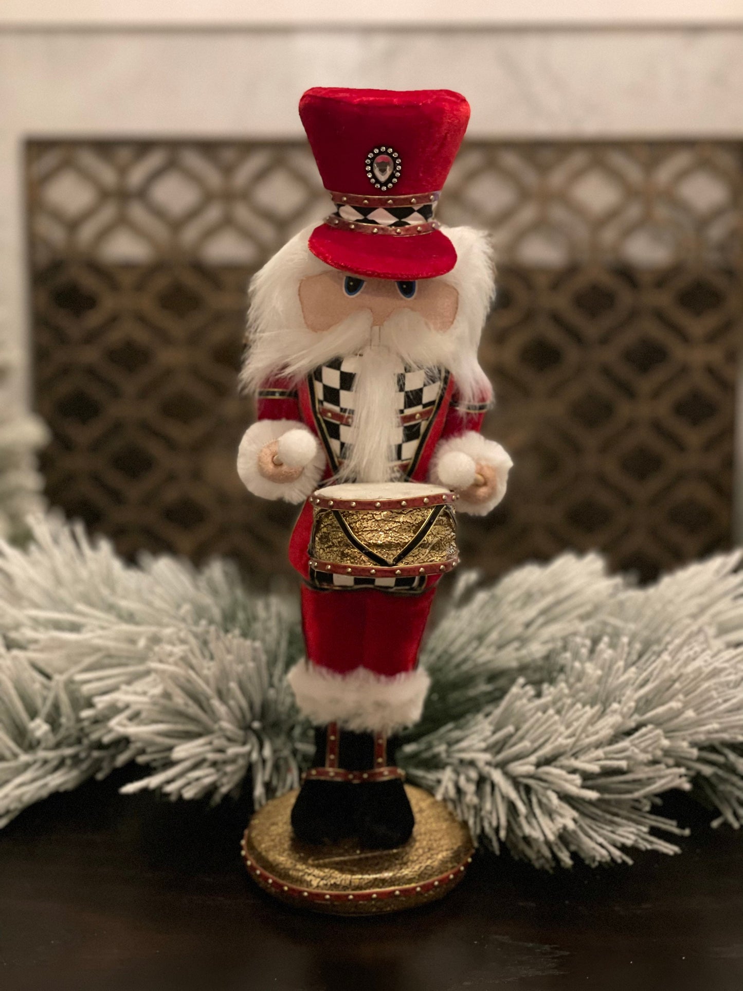 16” Nutcracker in red velvet with a checkered pattern band in his hat that matches his jacket