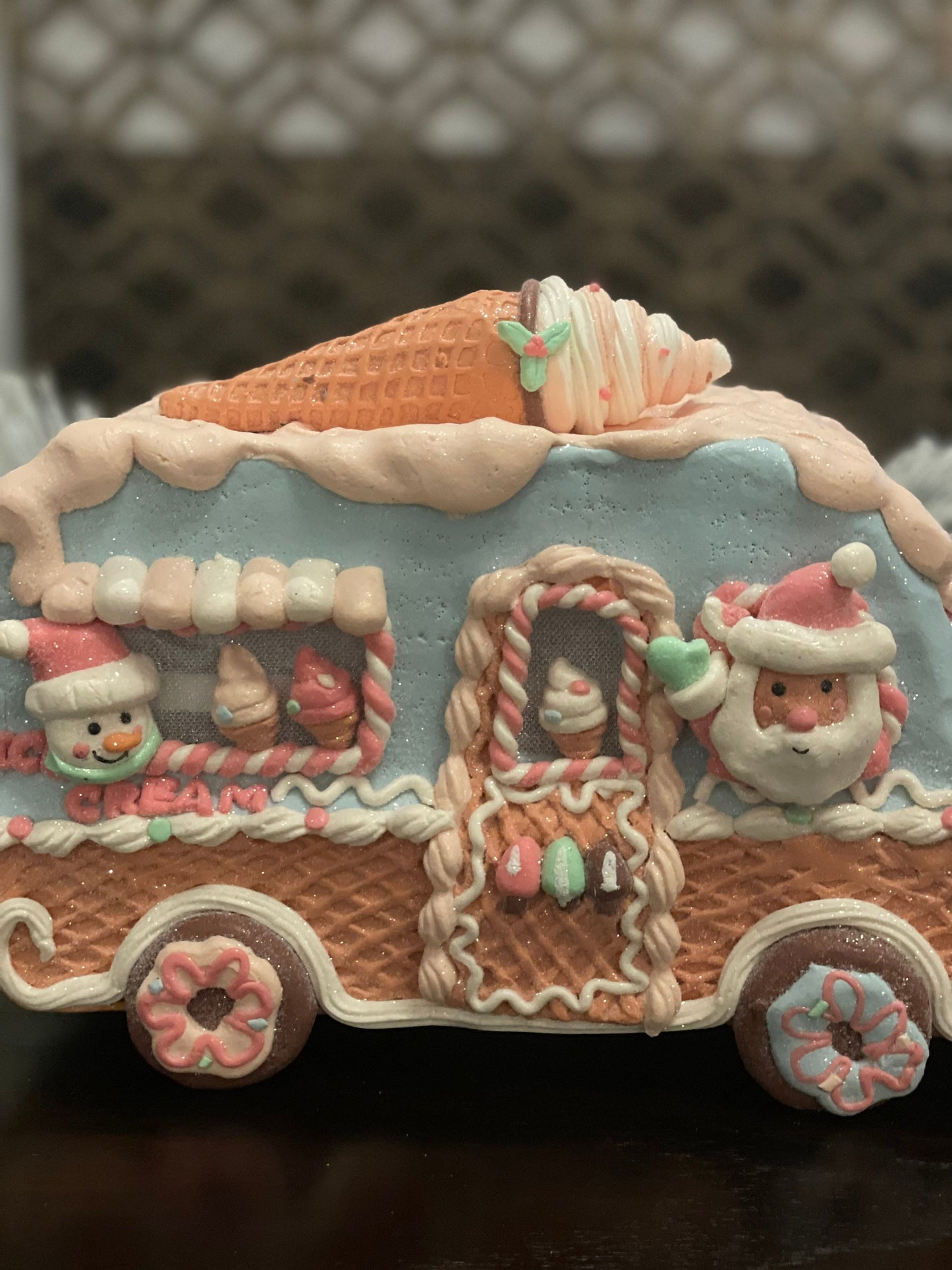 11”L x 8”H x 6W. Gingerbread ice cream truck. Lighted. Pastel colors.