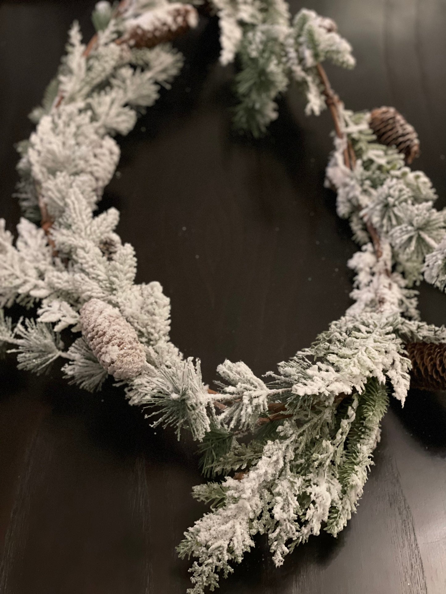 6 ft mixed snow pine cone garland.