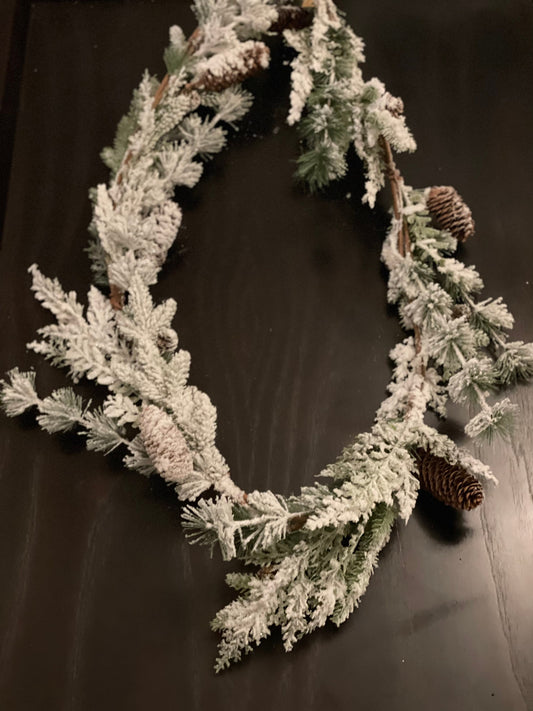 6 ft mixed snow pine cone garland.