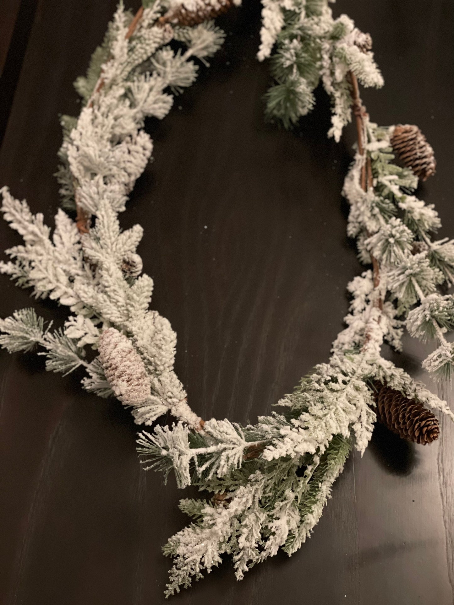 6 ft mixed snow pine cone garland.