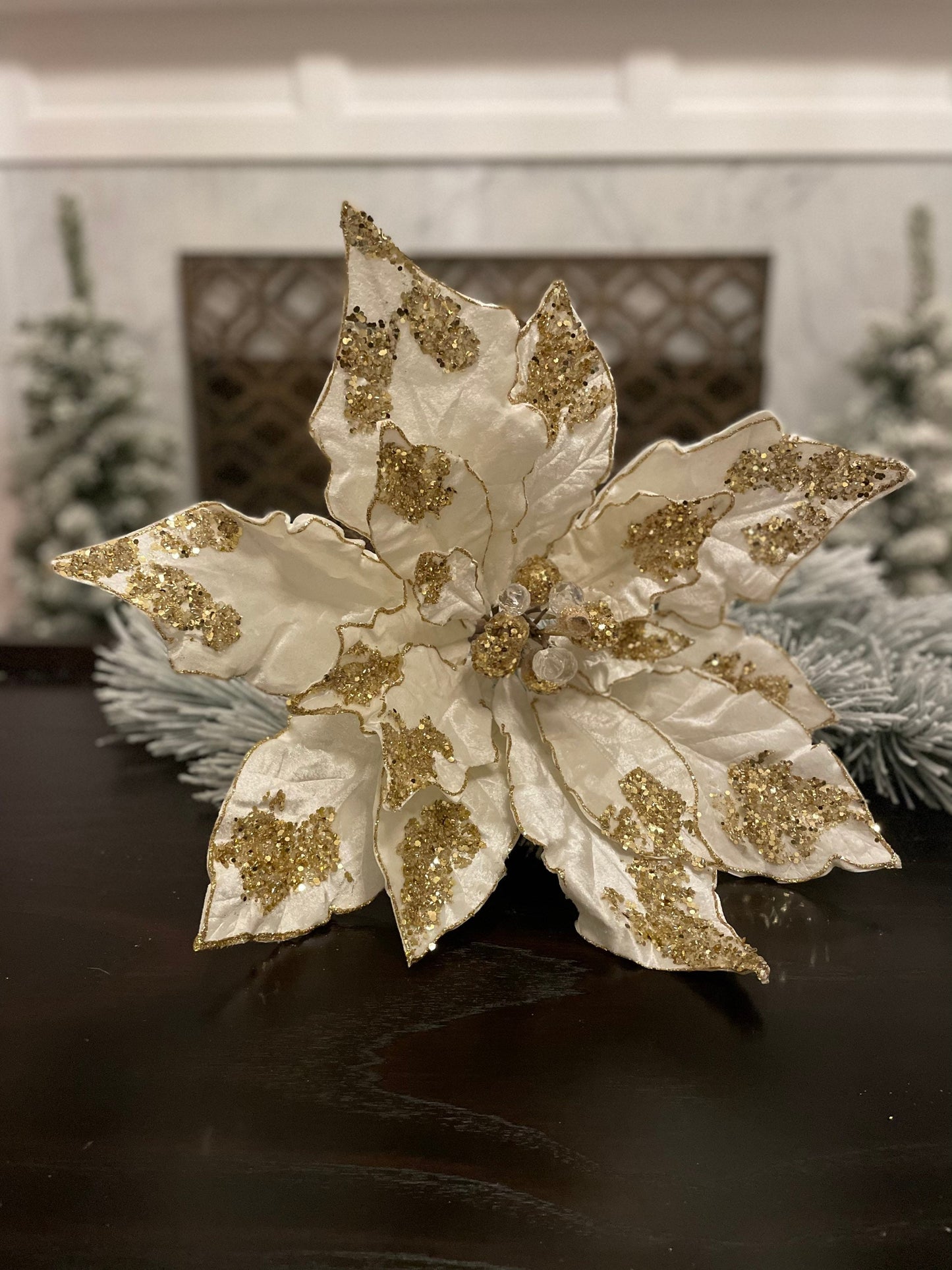 21”Extra large velvet Poinsettia with stem light ivory and gold. Sequins and glitter. Poinsettia measures 21” tip to tip. Stem is 14.5”.