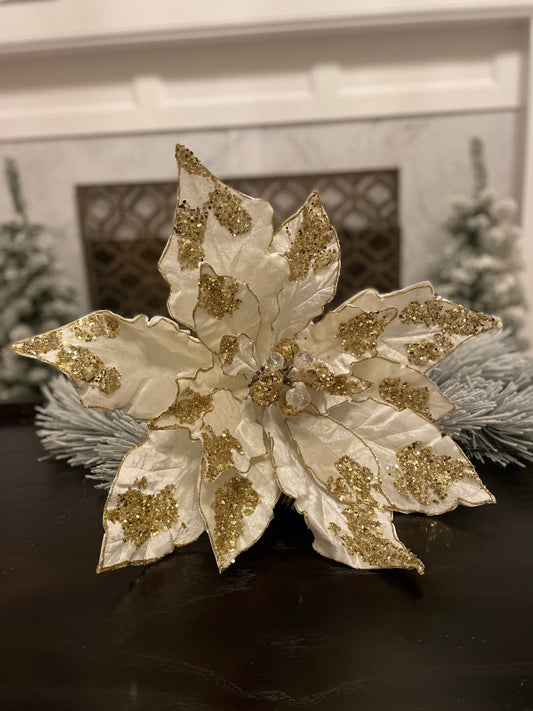 21”Extra large velvet Poinsettia with stem light ivory and gold. Sequins and glitter. Poinsettia measures 21” tip to tip. Stem is 14.5”.