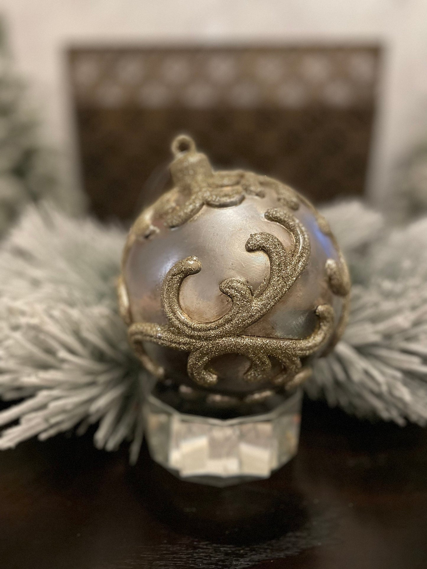 7” Vp. Ball embossed champagne with glitter.