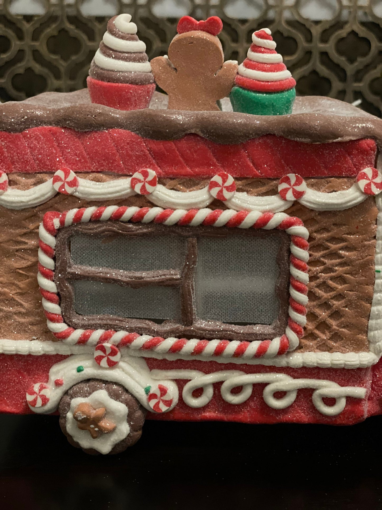 11”L x 8”H x 6W. Gingerbread cupcake truck. Lighted.