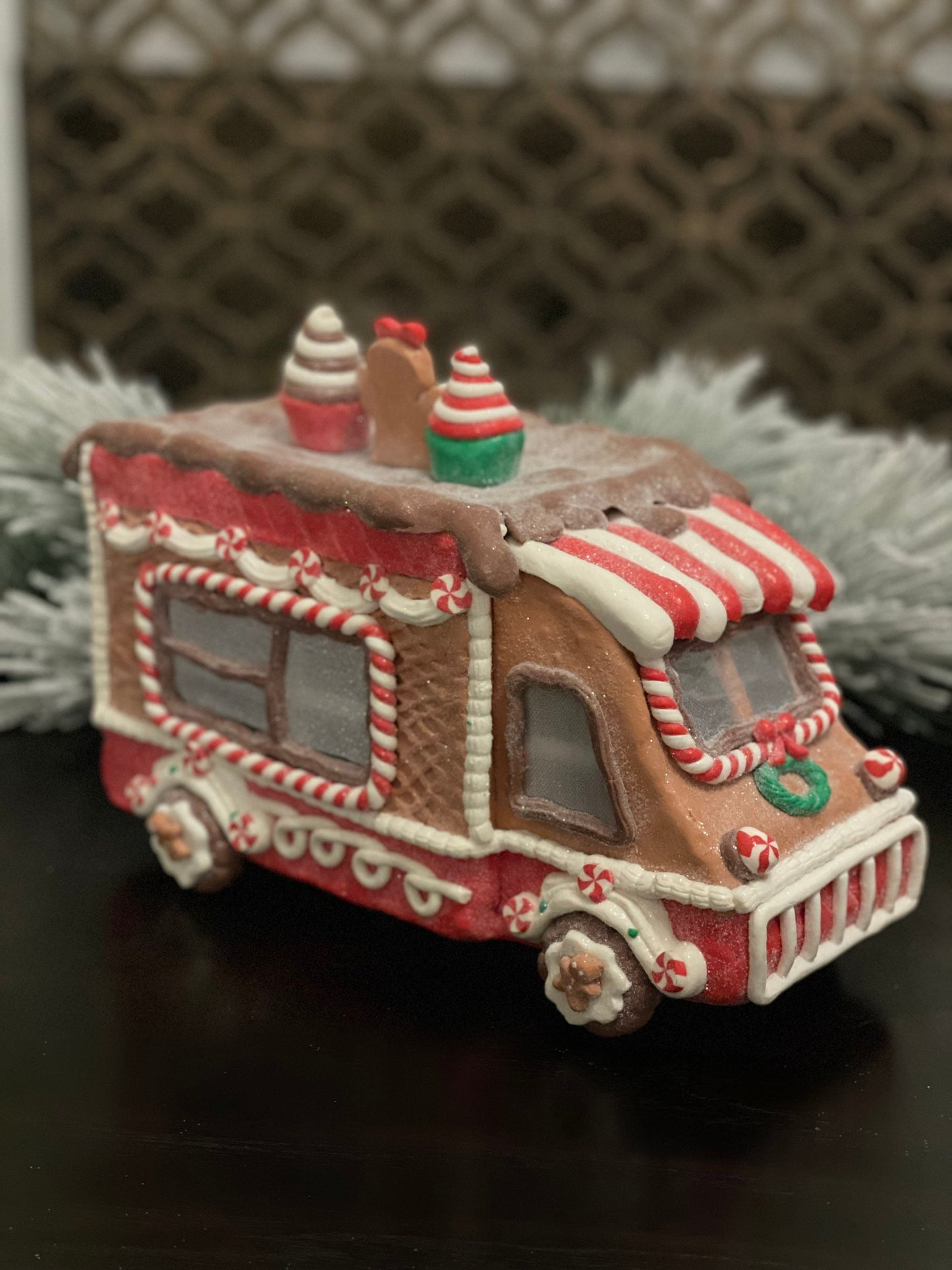 11”L x 8”H x 6W. Gingerbread cupcake truck. Lighted.