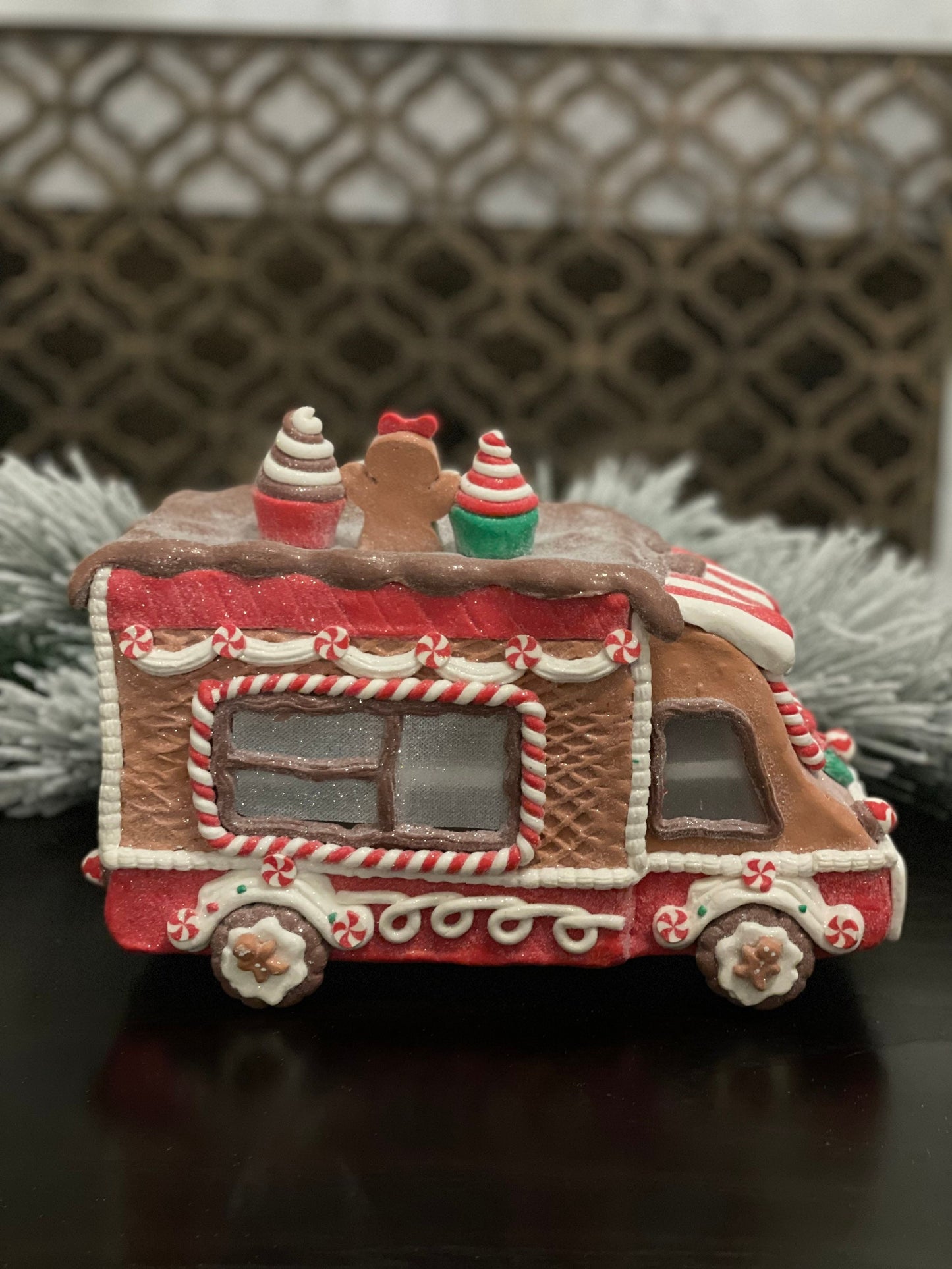 11”L x 8”H x 6W. Gingerbread cupcake truck. Lighted.