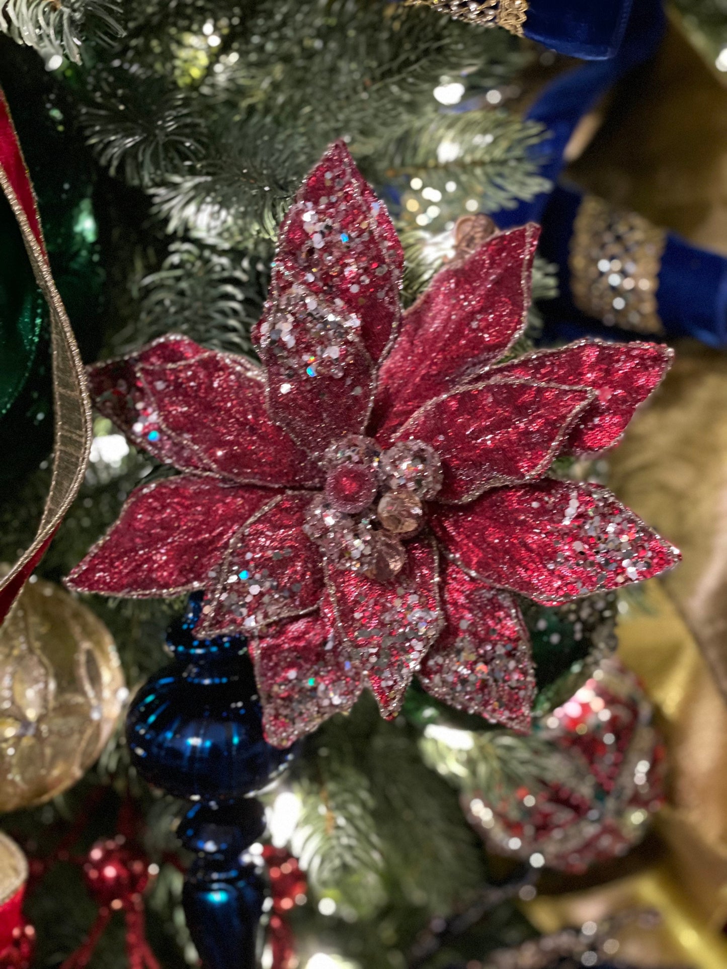 8” Red poinsettia beaded and metallic. red and soft gold. Clip poinsettia.