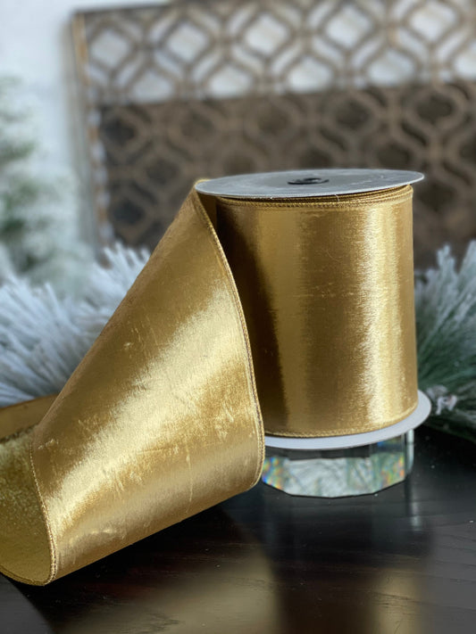 6” x 10 yds. Designer luster velvet gold ribbon with gold back.*