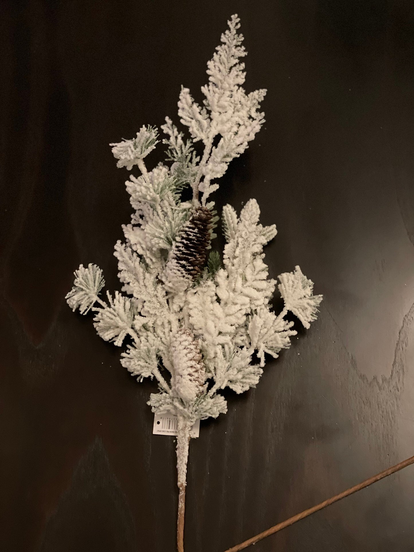 29" Mixed snow pine cone spray.