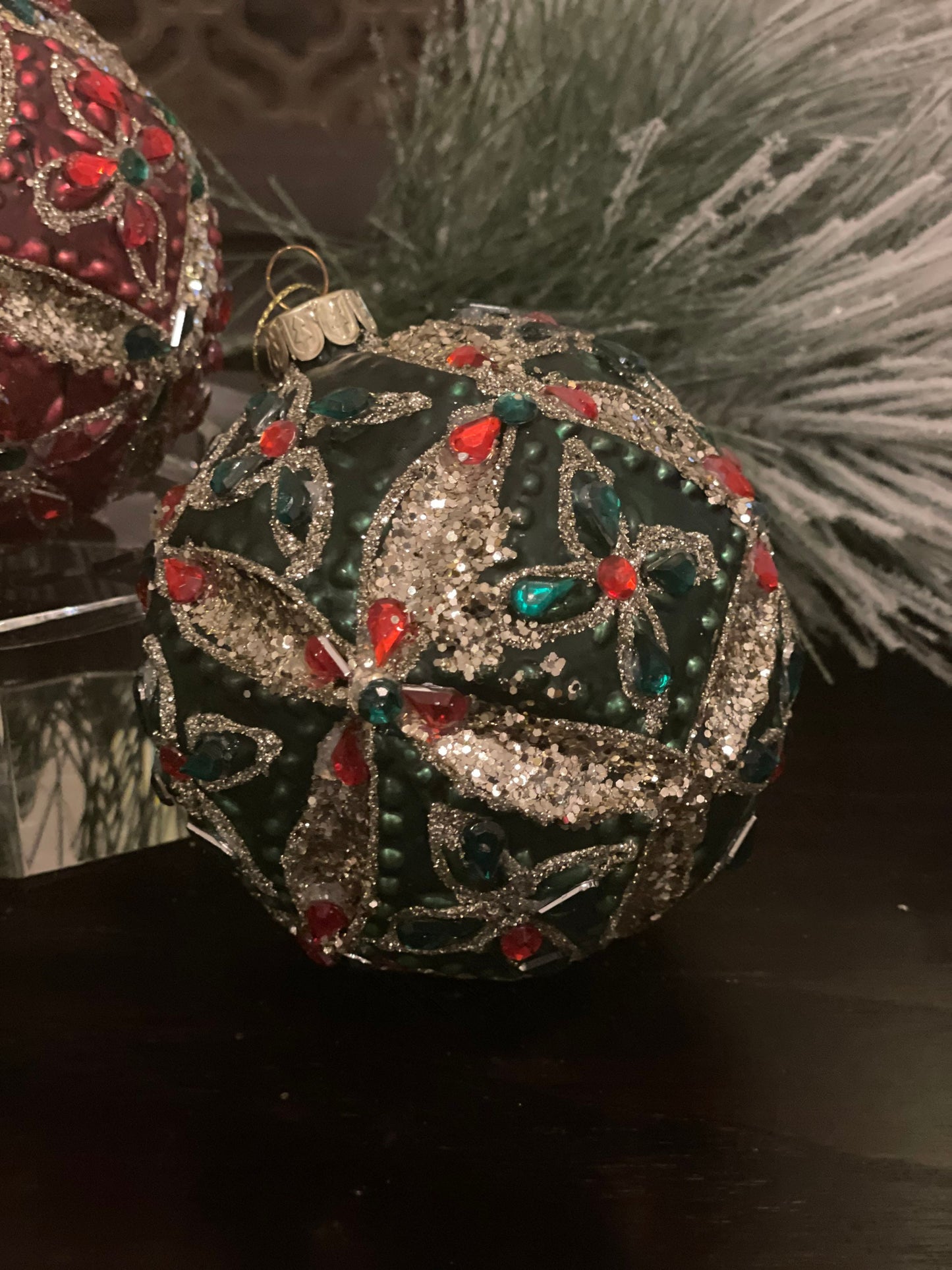 4” glass flower red and green ball ornament. Set of 2. One red and one green.