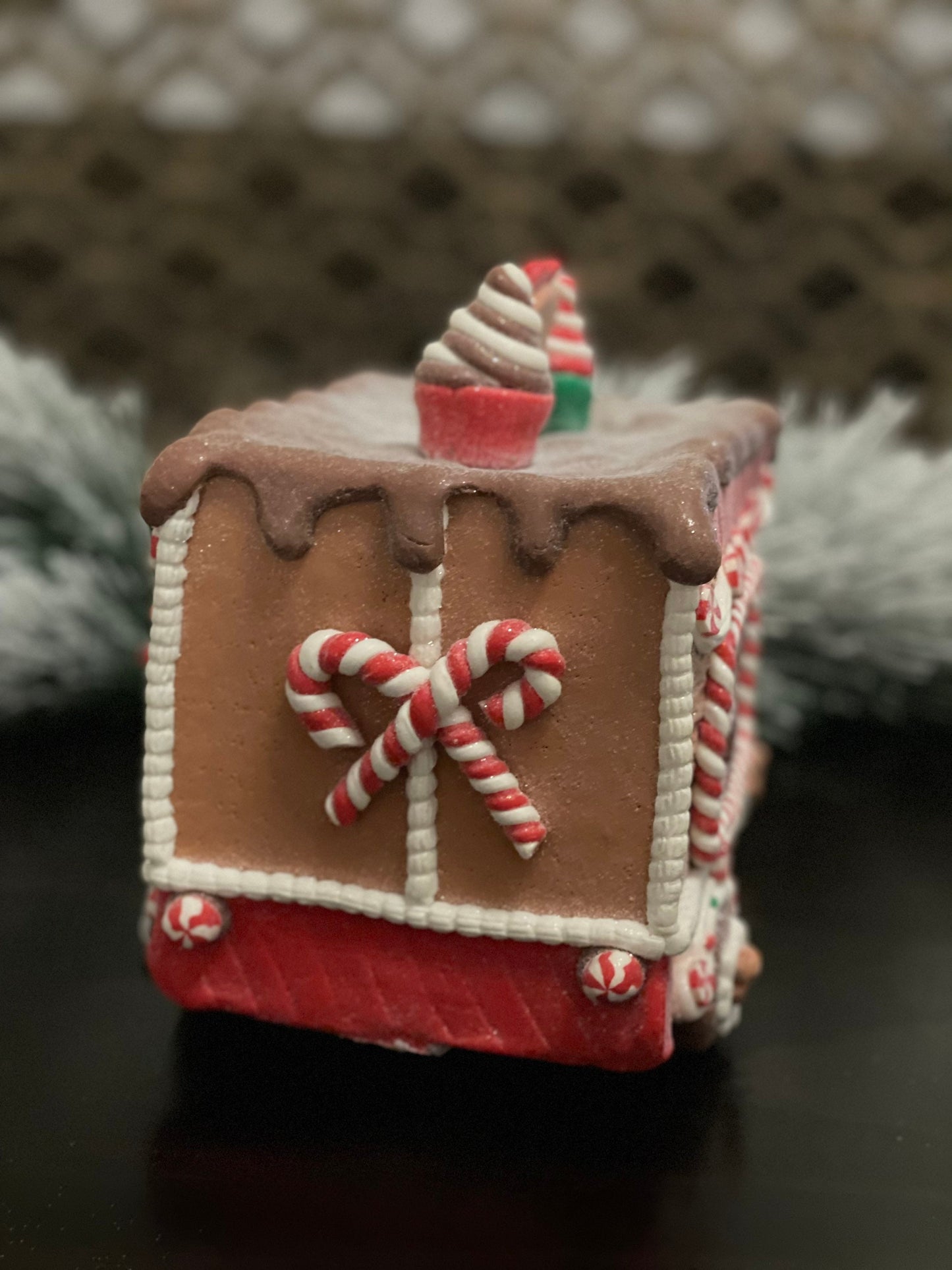 11”L x 8”H x 6W. Gingerbread cupcake truck. Lighted.