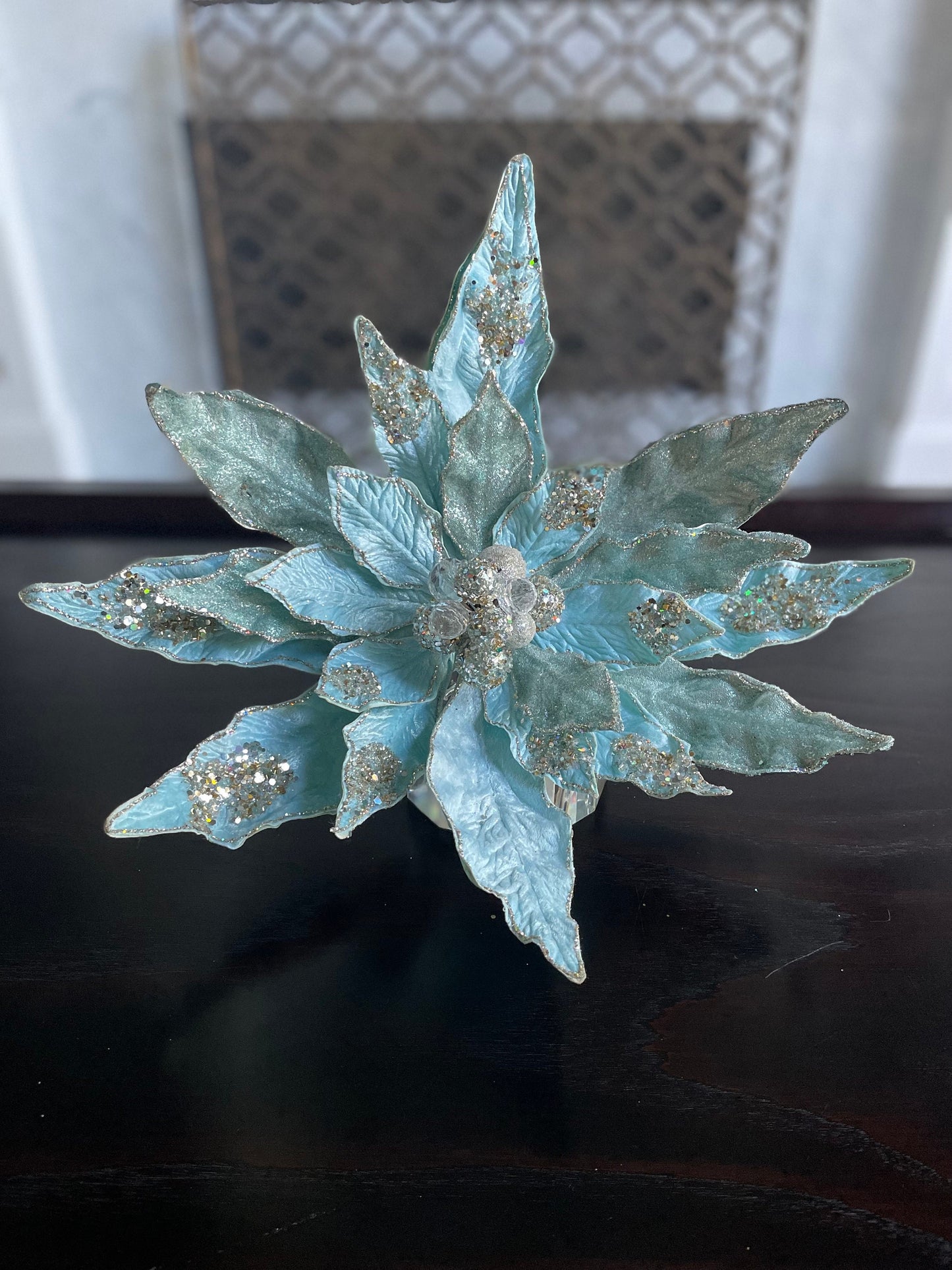 17.5” Clip Poinsettia beaded and glitter soft blue. 17.5” tip to tip.