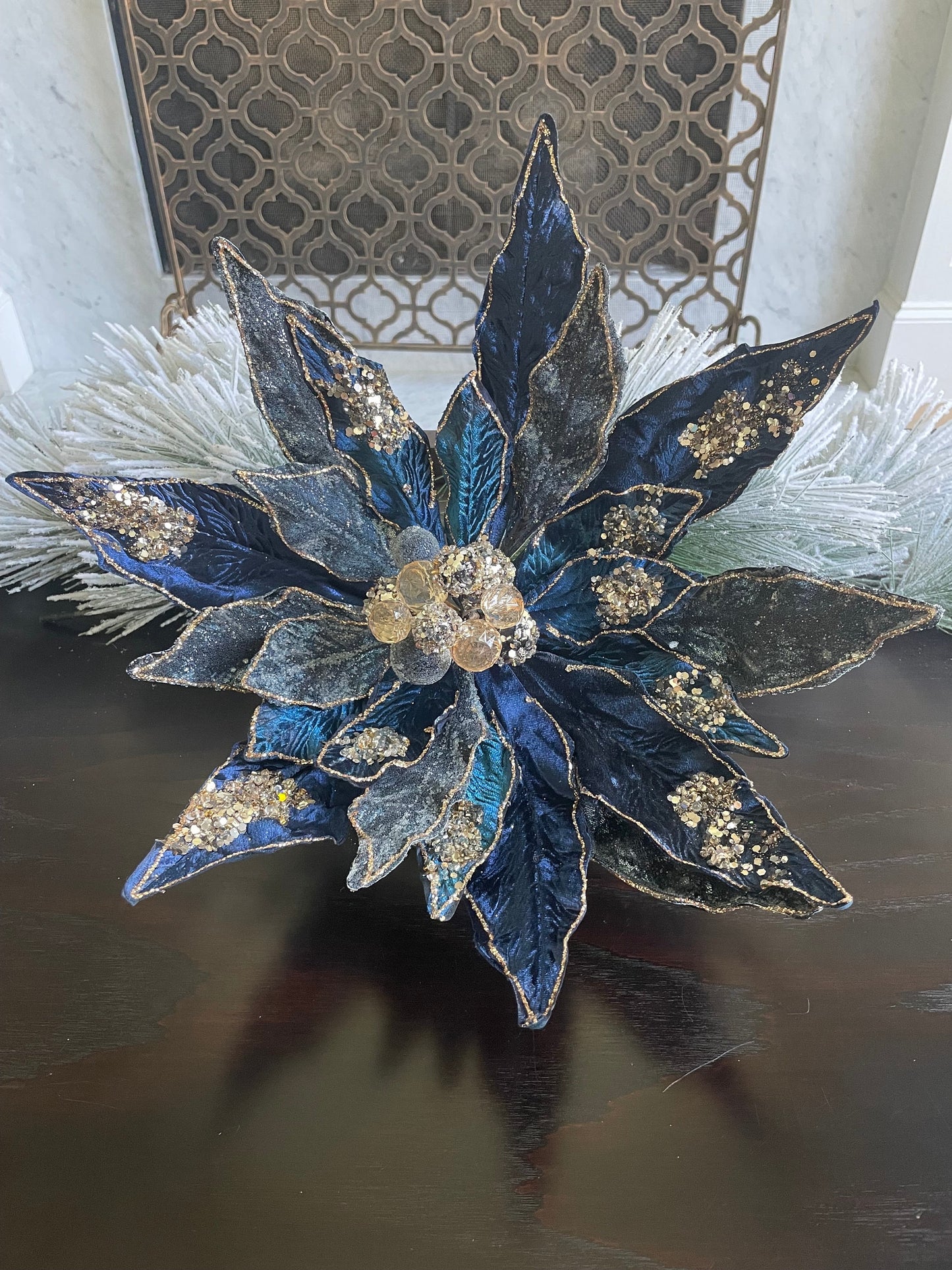 17.5” Poinsettia clip sapphire rose gold. Beaded and glitter. 17.5” tip to tip.