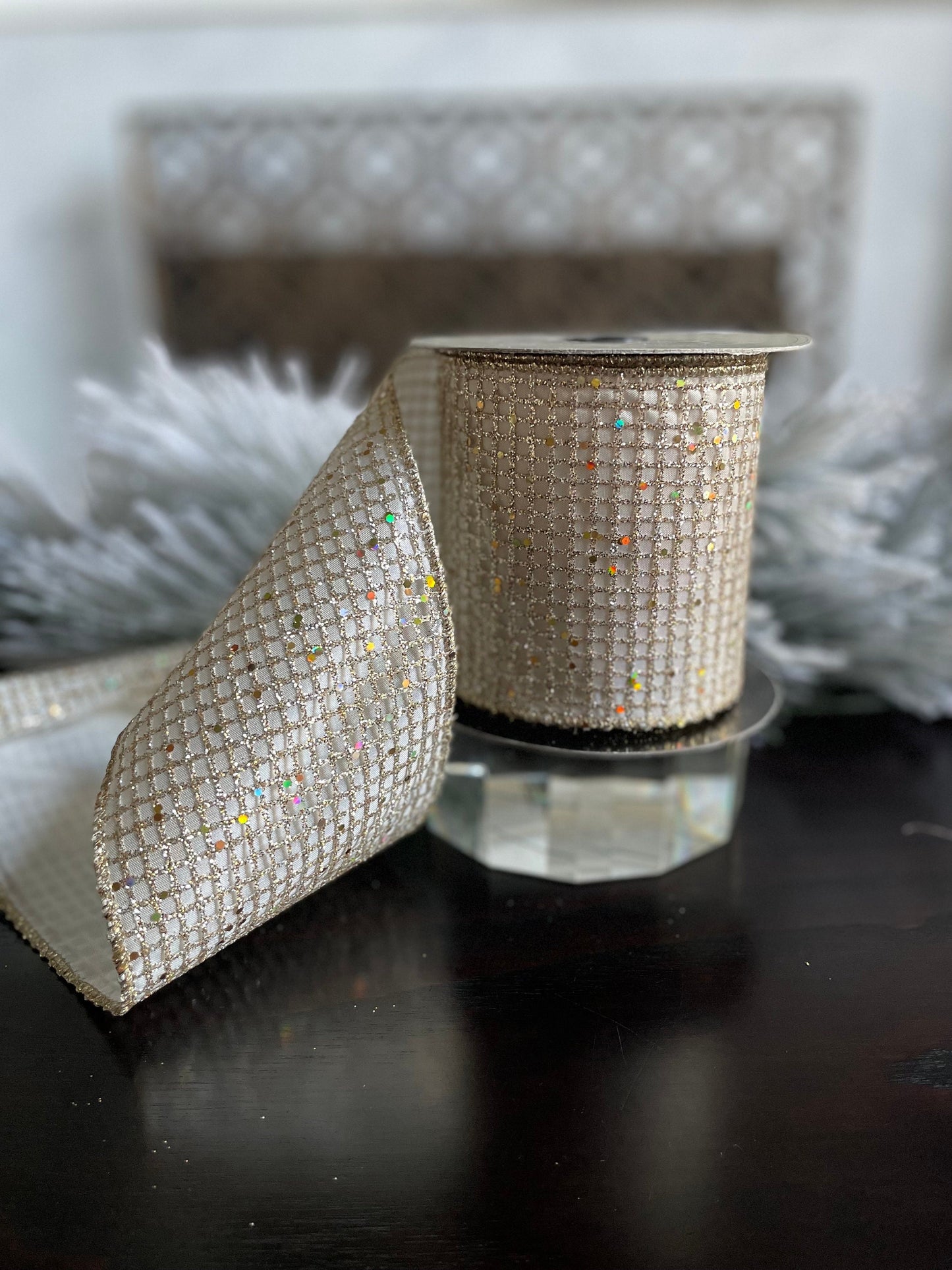 4” x 10 yds. Designer taffeta glitter mesh platinum-ivory ribbon. Wired. D. Stevens.