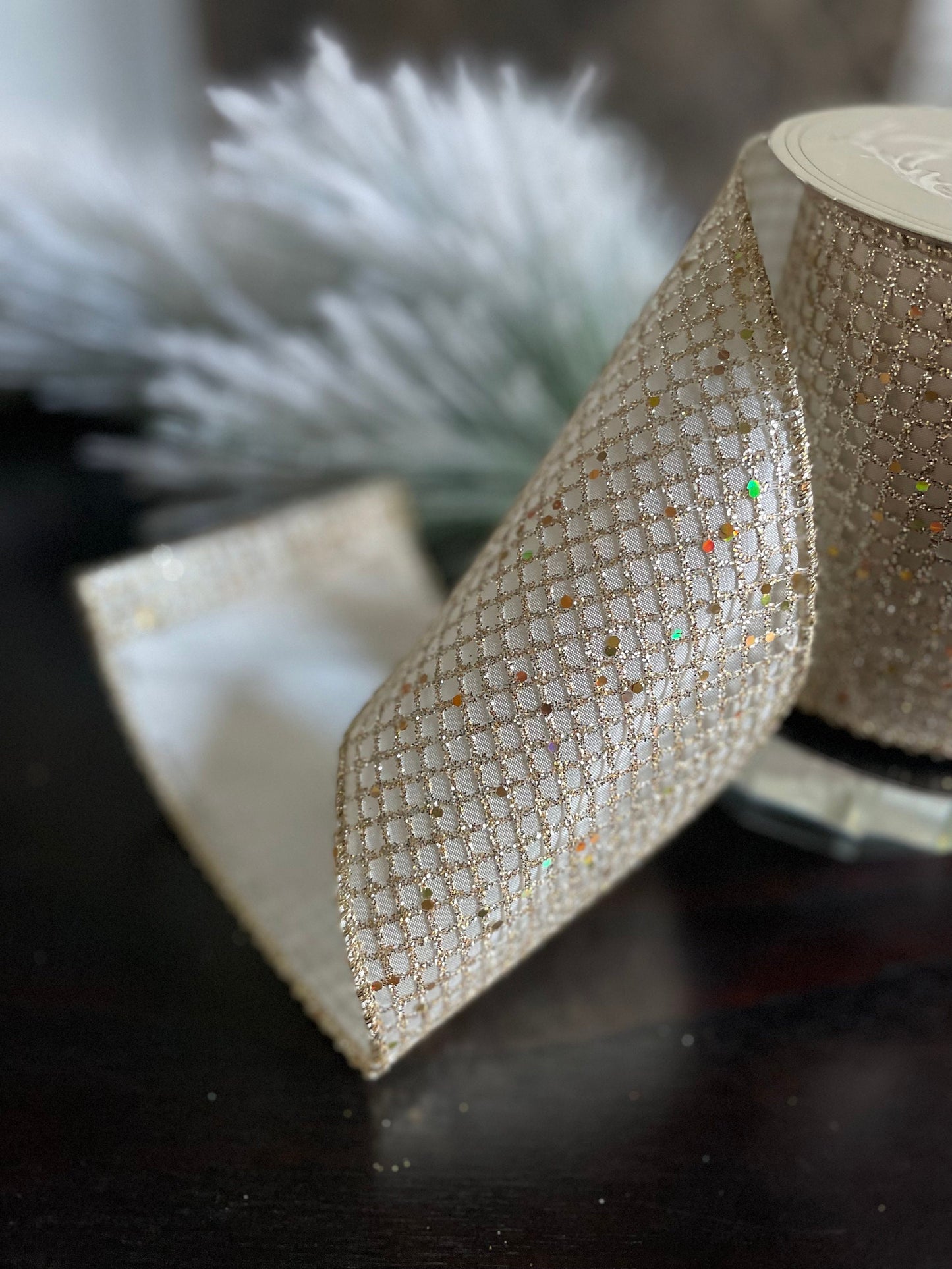 4” x 10 yds. Designer taffeta glitter mesh platinum-ivory ribbon. Wired. D. Stevens.