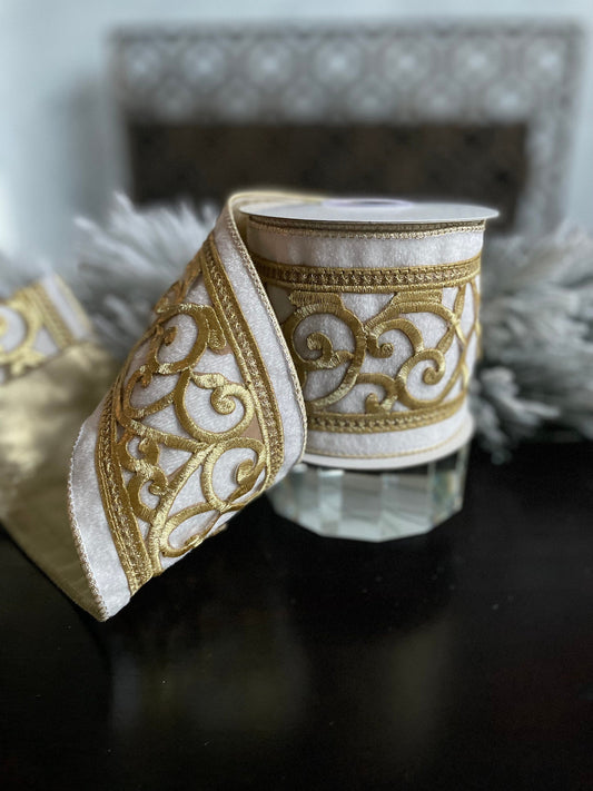 4” x 5 yds. Designer ivory and gold trim on velvet ribbon. Wired. Regency.