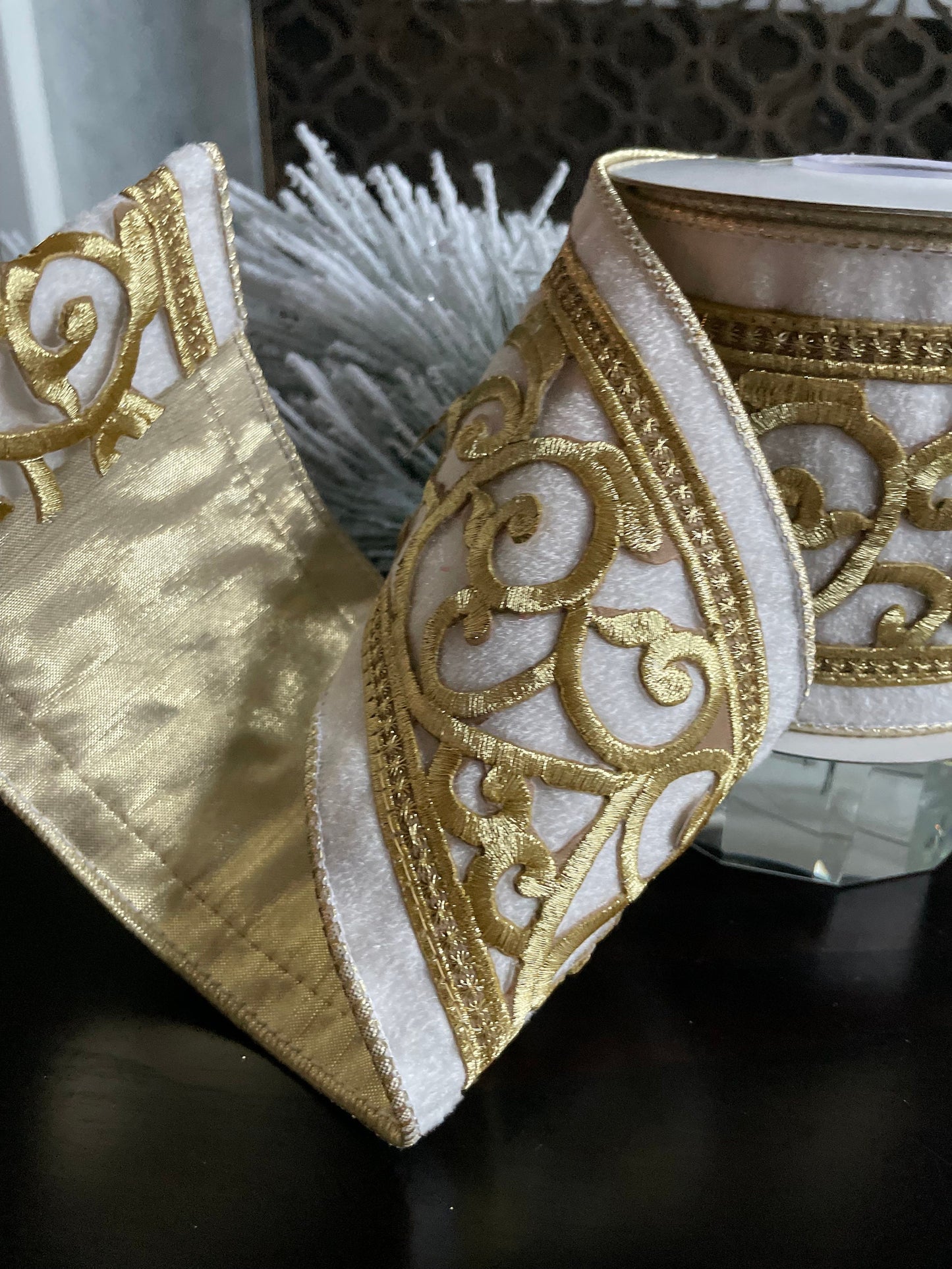 4” x 5 yds. Designer ivory and gold trim on velvet ribbon. Wired. Regency.