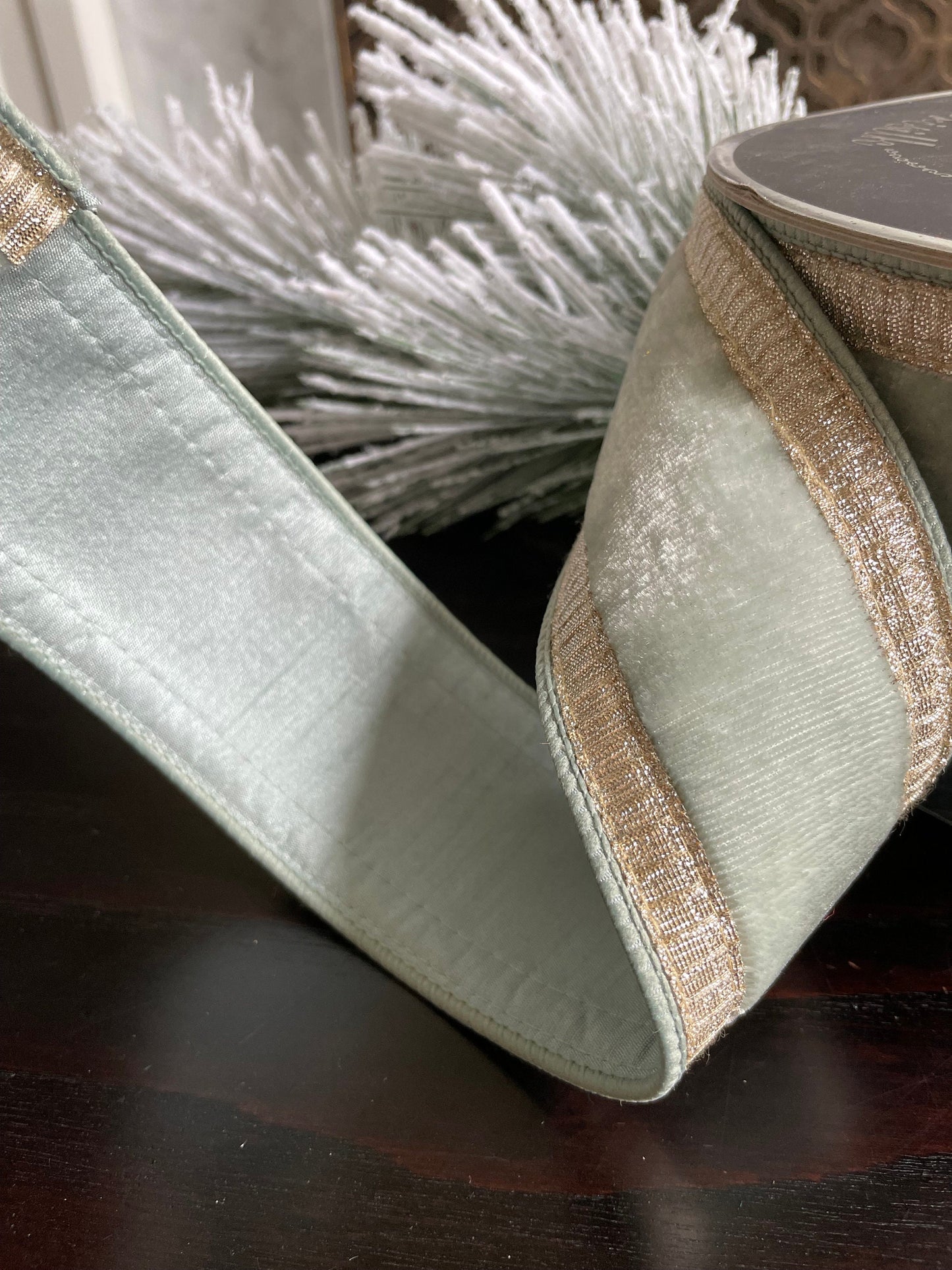 2.5” x 10 yds. Designer pleated borders velvet light blue- platinum ribbon. Wired. Farrisilk.