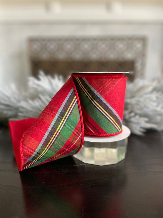 4” x 5 yds. Designer diagonal cut plaid dupion fused ribbon. Red, green, white, yellow, black. Wired. Regency.