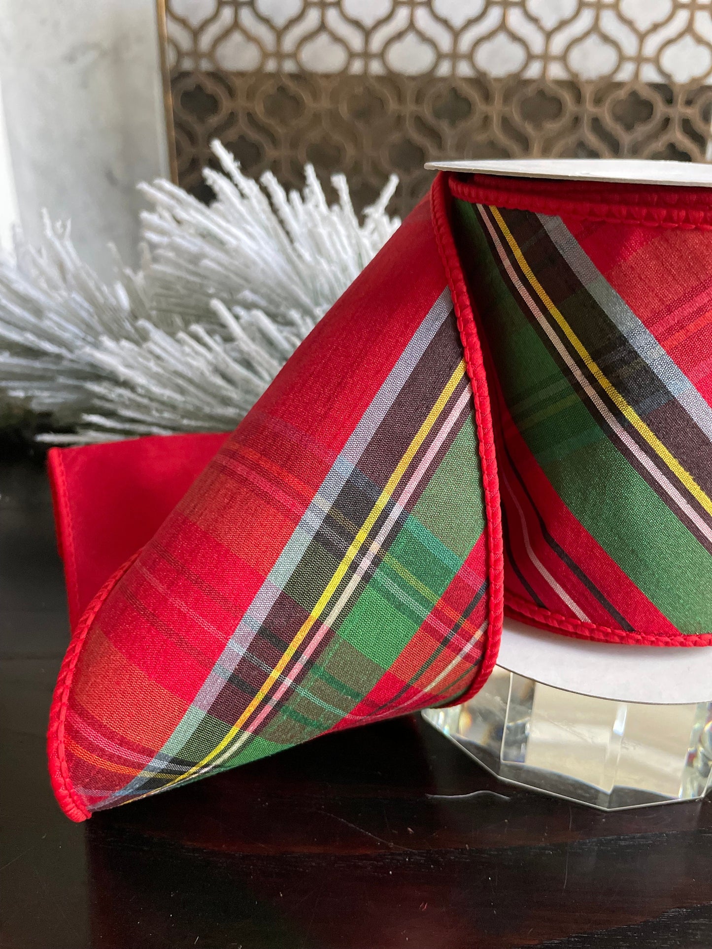 4” x 5 yds. Designer diagonal cut plaid dupion fused ribbon. Red, green, white, yellow, black. Wired. Regency.