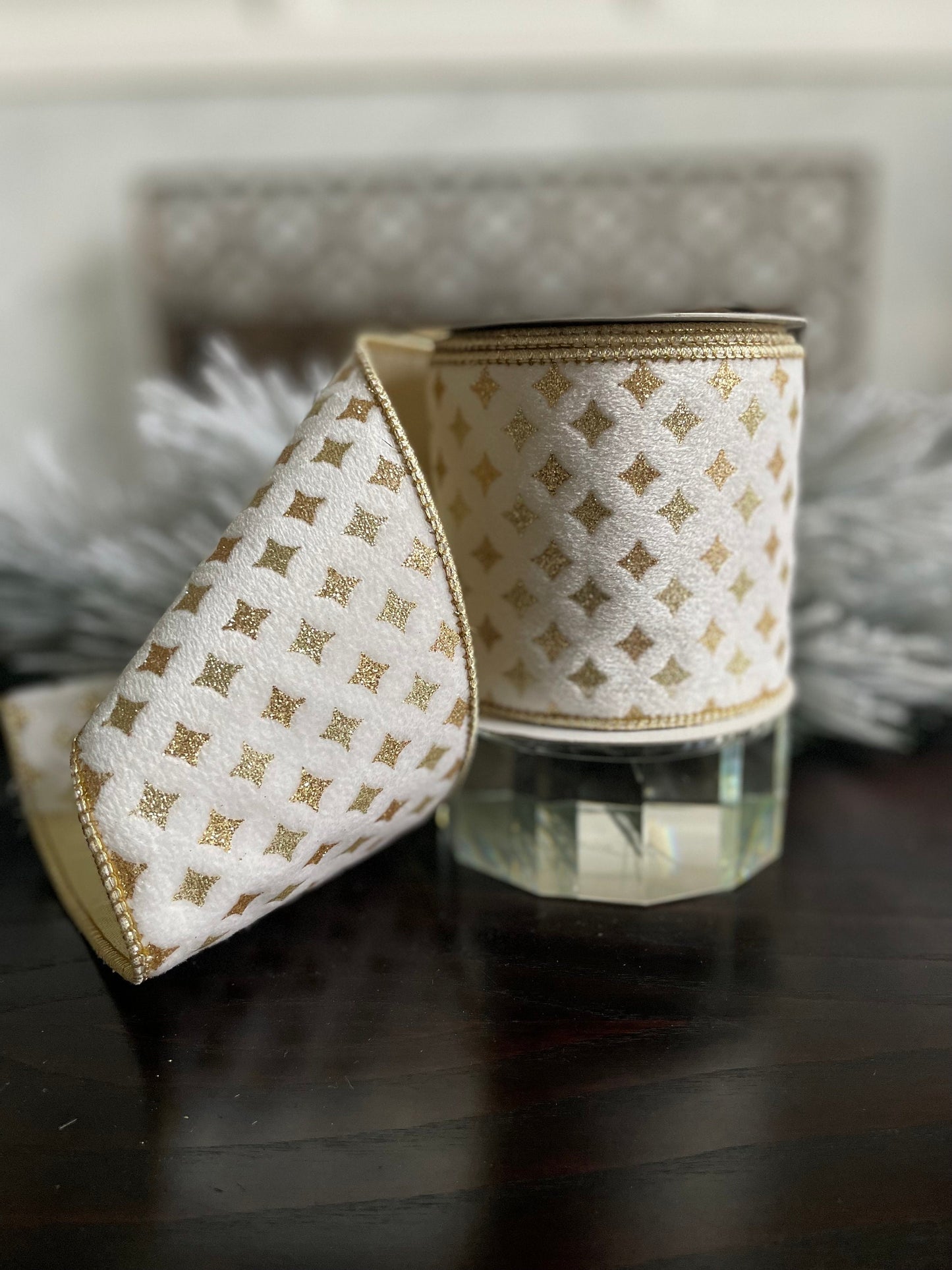 4” x 5 yds. Designer white and gold kismet glitter print velvet ribbon. Wired. Regency.