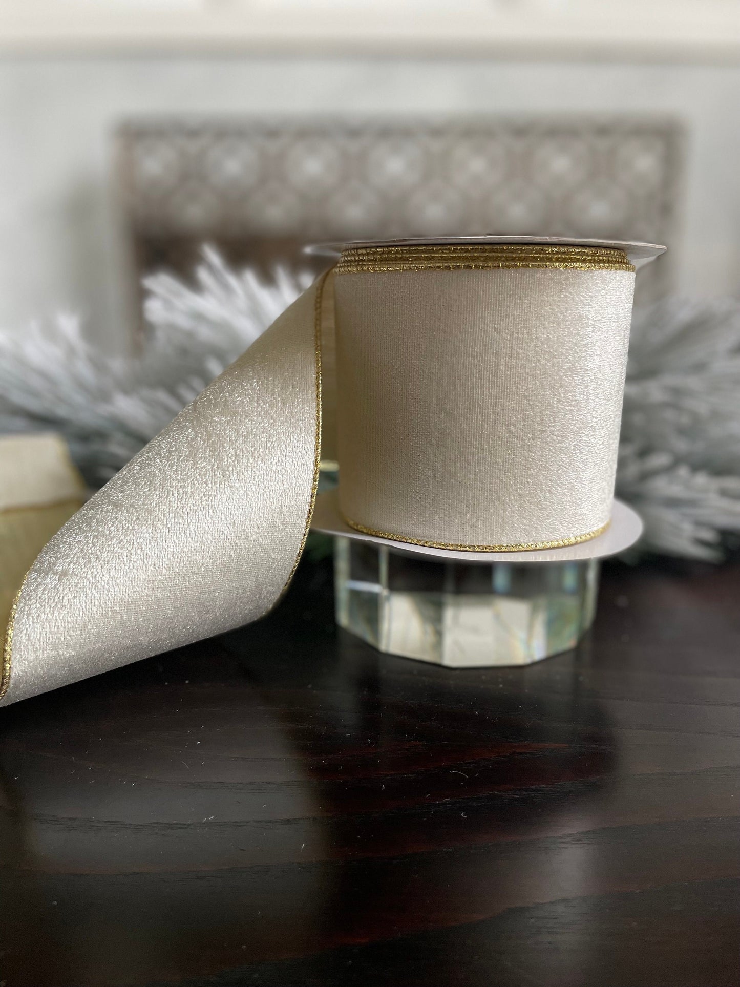 4” x 10 yds. White velvet and metallic gold back ribbon. Wired. Regency.