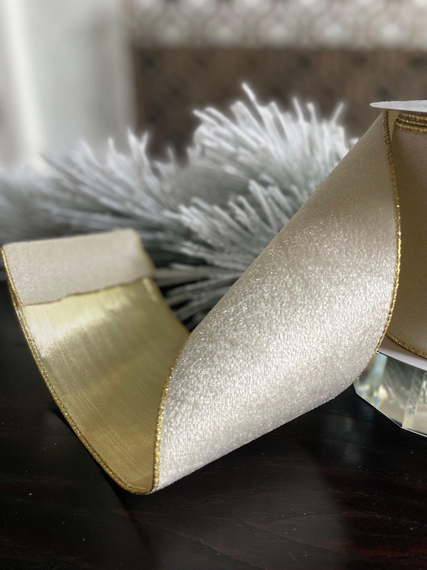 4” x 10 yds. White velvet and metallic gold back ribbon. Wired. Regency.