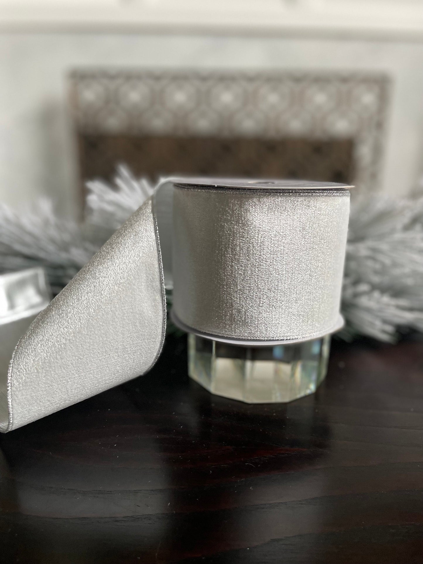 4” x 10 yds. White velvet and metallic silver back ribbon. Wired. Regency.