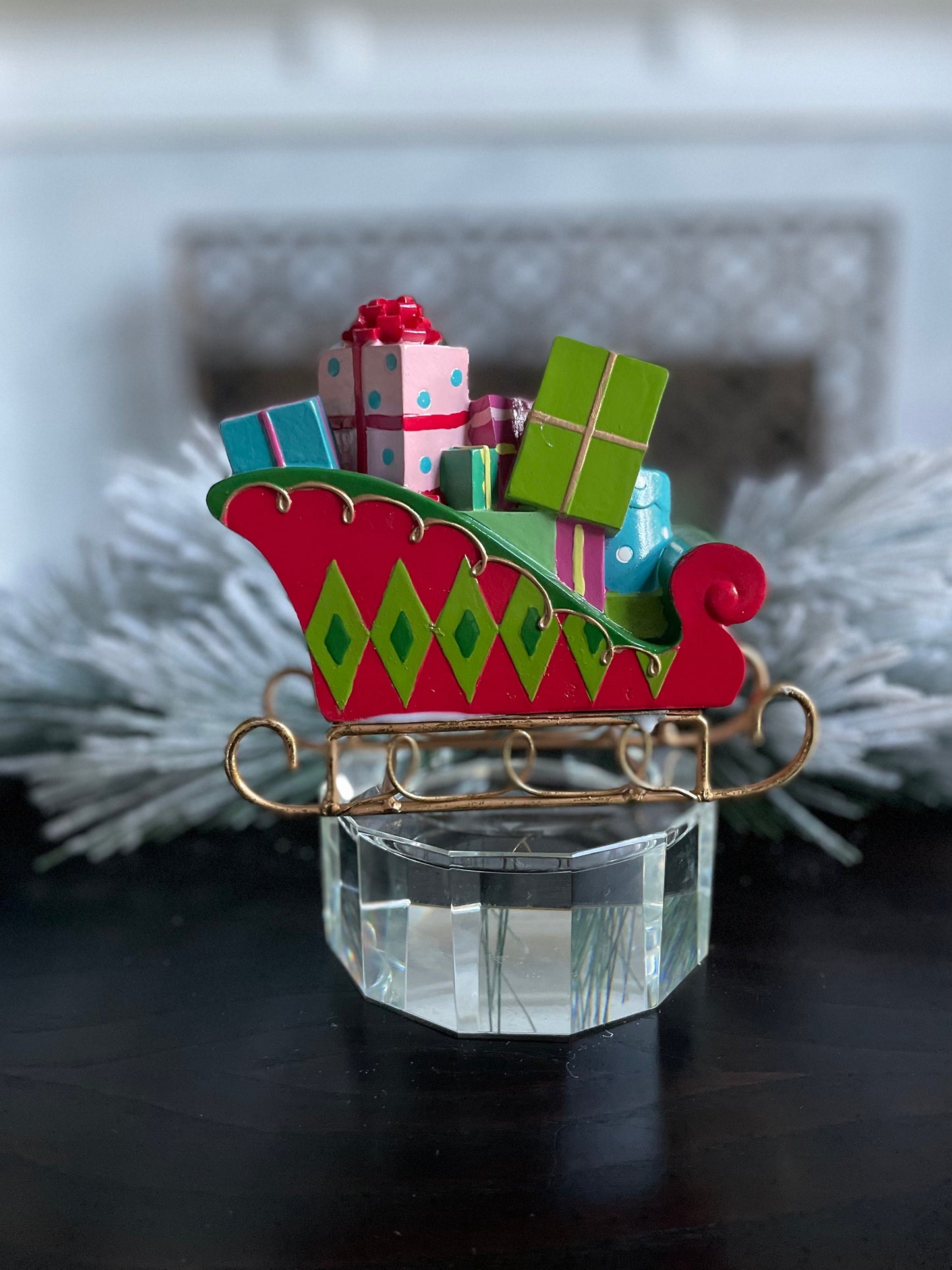 6” Resin sleigh with packages, tabletop ornament. Christmas. Multi color.