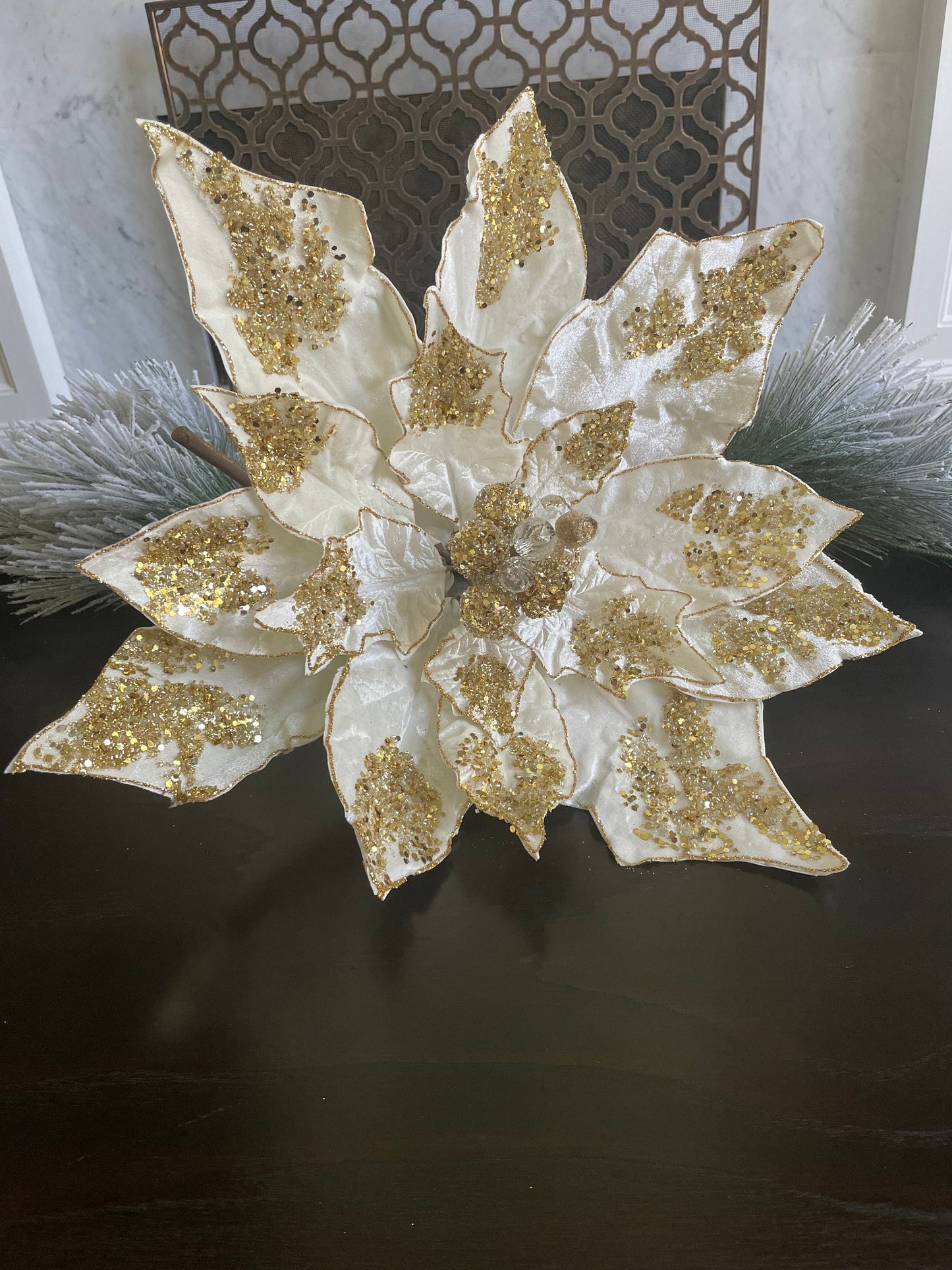 22” Poinsettia light ivory and gold glitter. 22” tip to tip. Stem poinsettia.